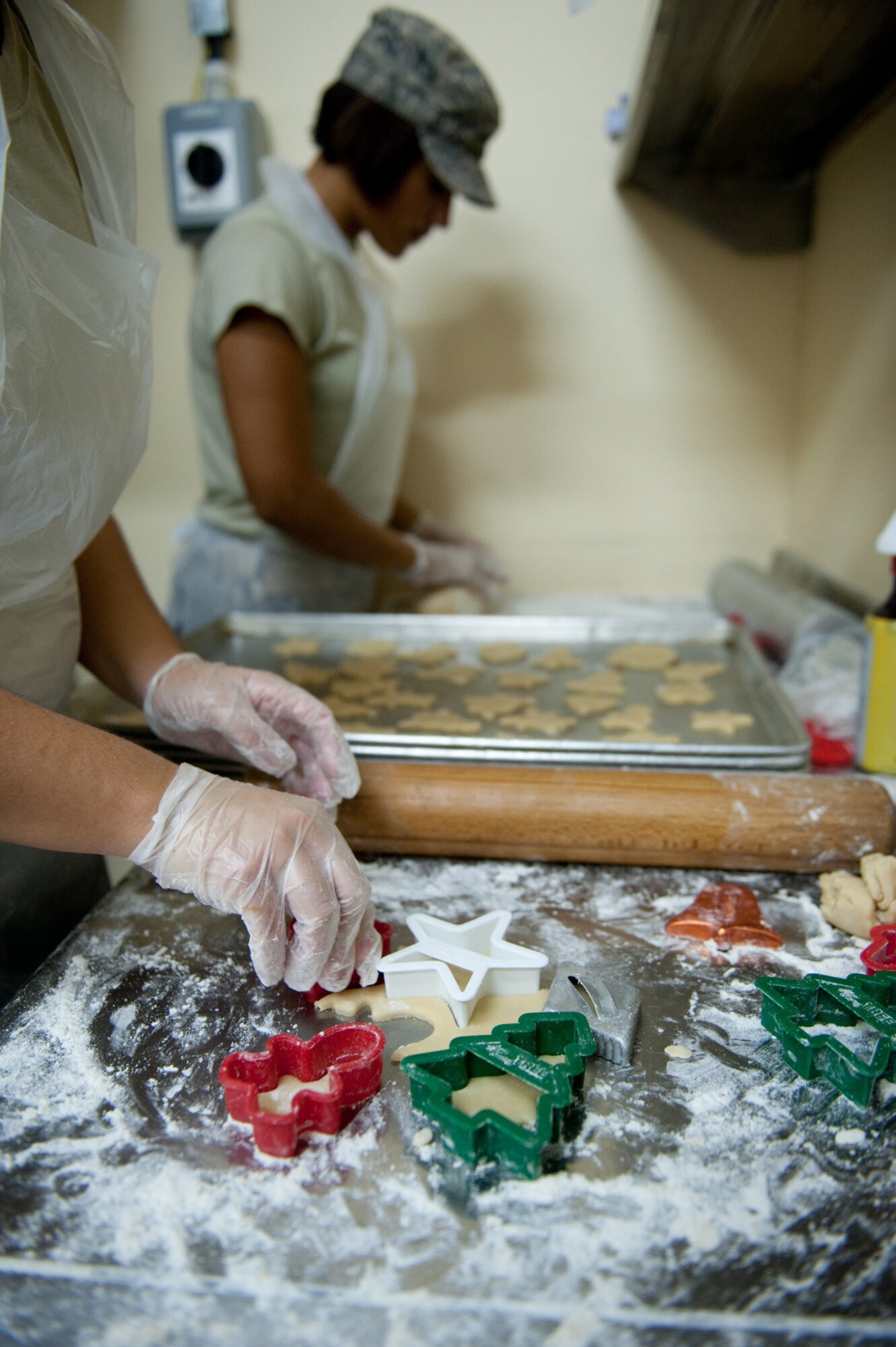 Senior Airman Aja Blair, 379th Expeditionary Force Support Squadron, prepares holiday cookies for servicemembers, Dec. 23, 2009, in Southwest Asia. Airmen Blair used a co-worker's family recipe to help those deployed during the holiday season feel more at home. (U.S. Air Force photo/Staff Sgt. Robert Barney)