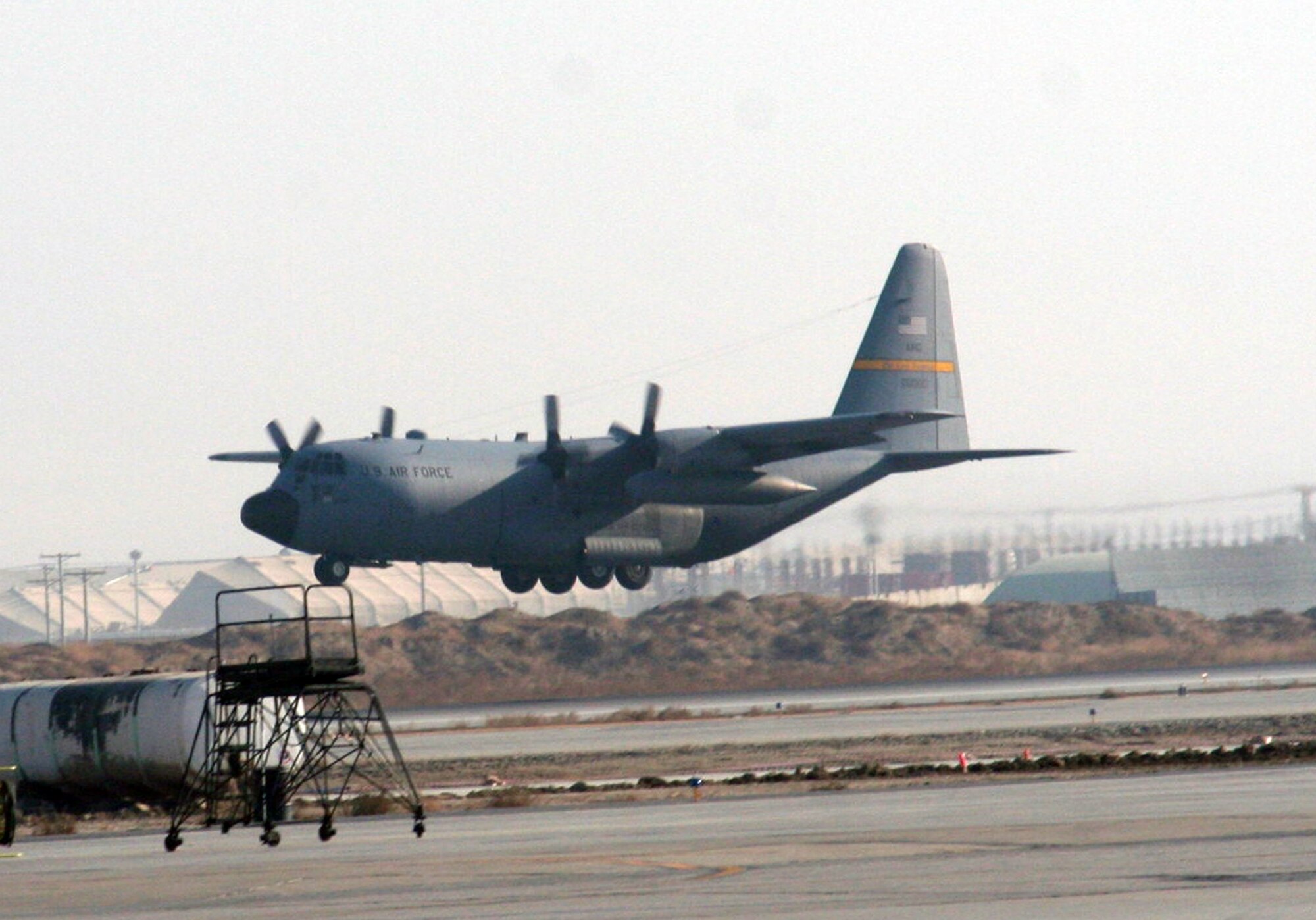 A C-130 Hercules takes off on an airlift mission for Operation Enduring Freedom on Dec. 25, 2009, from Bagram Air Field, Afghanistan. (U.S. Air Force Photo/Tech. Sgt. Scott T. Sturkol)