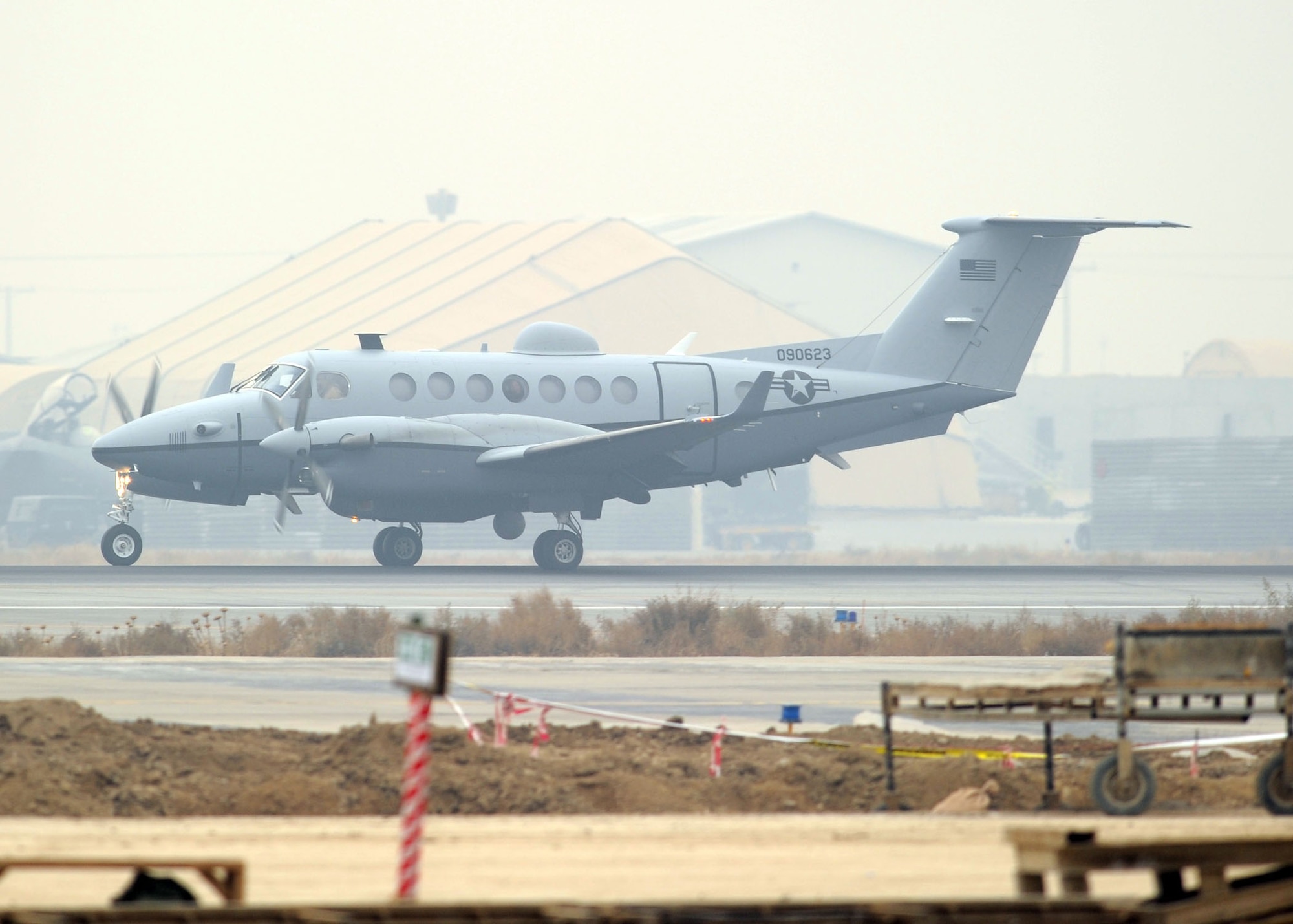 BAGRAM AIRFIELD, Afghanistan -- Bagram Airfield welcomed its first Air Force MC-12 to Afghanistan Dec. 27, 2009.  The aircraft brings another capability to Operation Enduring Freedom because the MC-12 is not just an aircraft, but a complete collection, processing, analysis and dissemination system of Airmen committed to securing Afghanistan and protecting Afghan and Coalition lives.  (U.S. Air Force photo/Senior Airman Felicia Juenke)