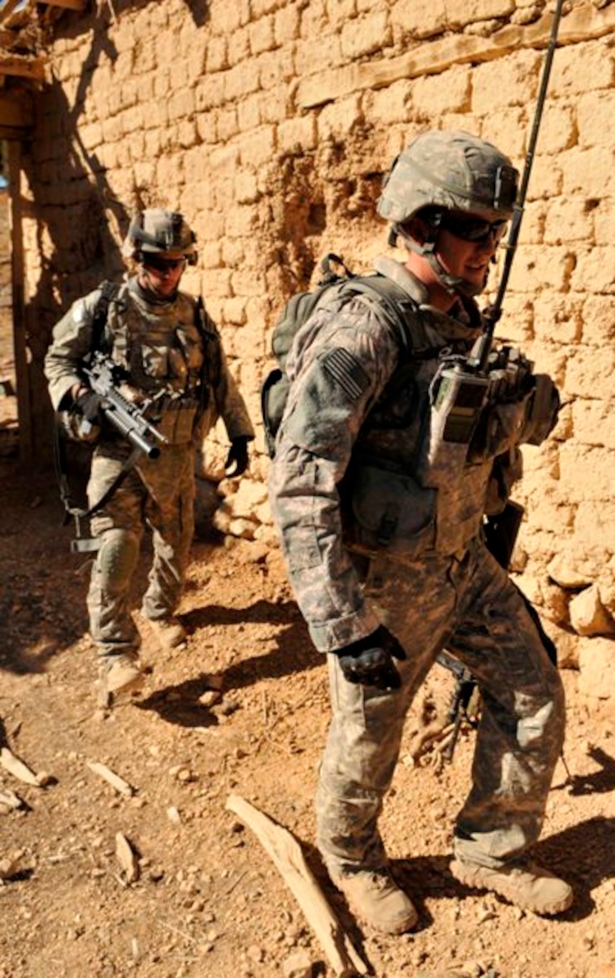 KHOST PROVINCE, Afghanistan - U.S Army Sgt. Joshua Smith (left), infantryman, and 1st Lt. Kevin Jewell, Jr., a platoon leader, both from the 1st Squadron, 40th Cavalry Regiment, 4th Brigade Combat Team, 25th Infantry Division, out of Fort Richardson, Alaska, clear and search the “Taliban Hotel,” a safehouse utilized by insurgent fighters infiltrating Afghanistan, Dec. 18. The 1-40th Cav. Rgt. Soldiers partnered with the 707th Explosive Ordnance Disposal team, out of Fort Lewis, Wash., and Afghan National Security Forces to level the safehouse. (U.S. Air Force photo/Staff Sgt. Stephen J. Otero)