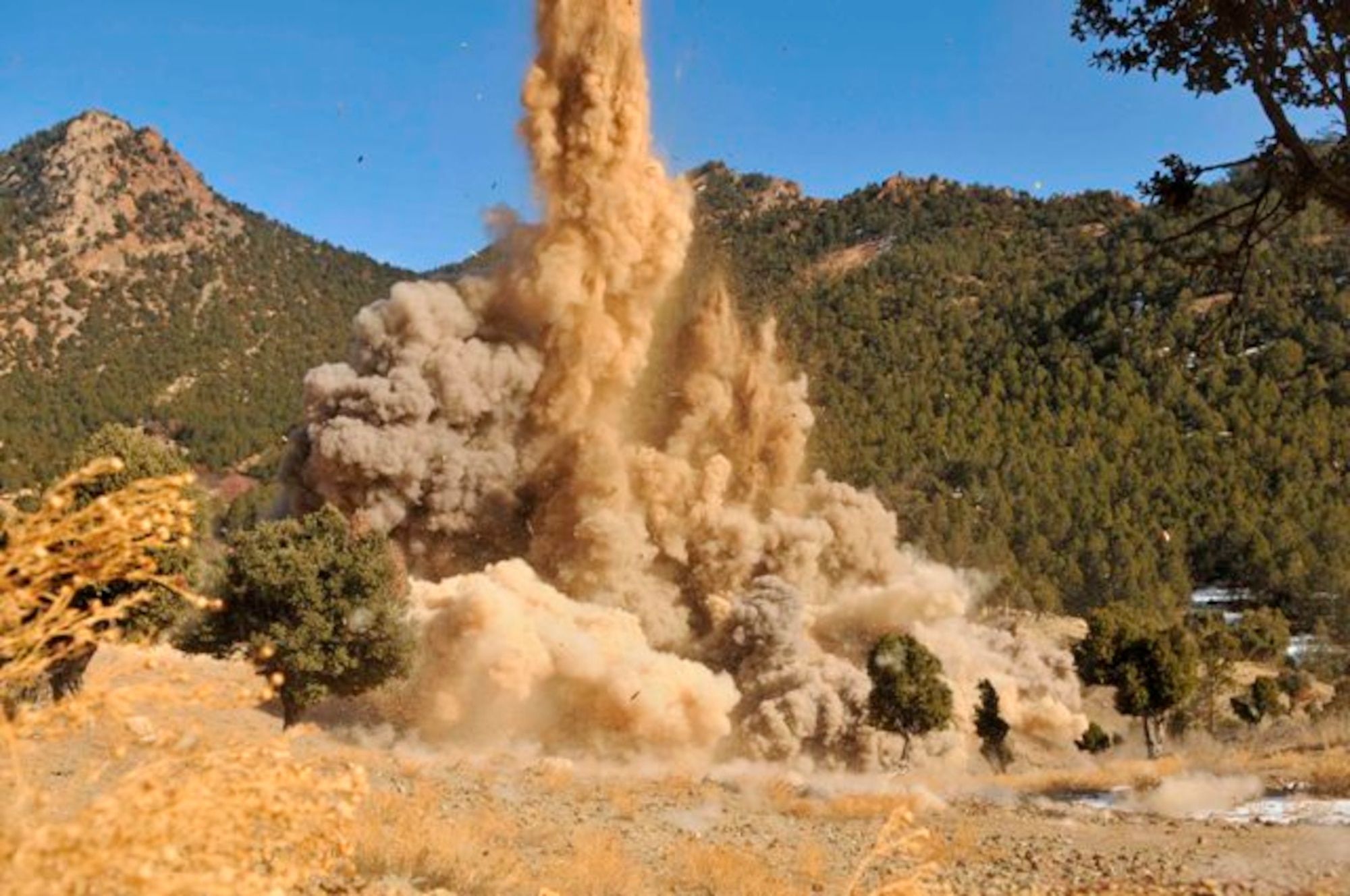 KHOST PROVINCE, Afghanistan - The demolition of the “Taliban Hotel,” a safehouse utilized by insurgent fighters infiltrating Afghanistan, Dec. 18. An Explosive Ordnance Disposal team from the 707th EOD unit, out of Fort Lewis, Wash., partnered with Soldiers from the 1st Squadron, 40th Cavalry Regiment, 4th Brigade Combat Team, 25th Infantry Division, out of Fort Richardson, Alaska, and Afghan National Security Forces to explosively level the safehouse. (U.S. Air Force photo/Staff Sgt. Stephen J. Otero)