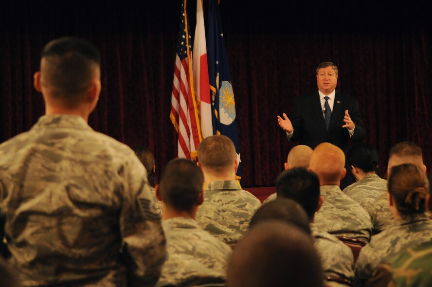 Mr. Michael Donley, Secretary of the Air Force, speaks to Airmen about ongoing developments within the service during an Airmen’s Call at Kadena Air Base, Japan, Dec. 22. Secretary Donley visited Kadena as part of a six-base Pacific tour to spend time with Airmen and thank them for serving overseas far from home during the holiday season. (U.S. Air Force photo / Airman 1st Class Amanda N. Grabiec)
