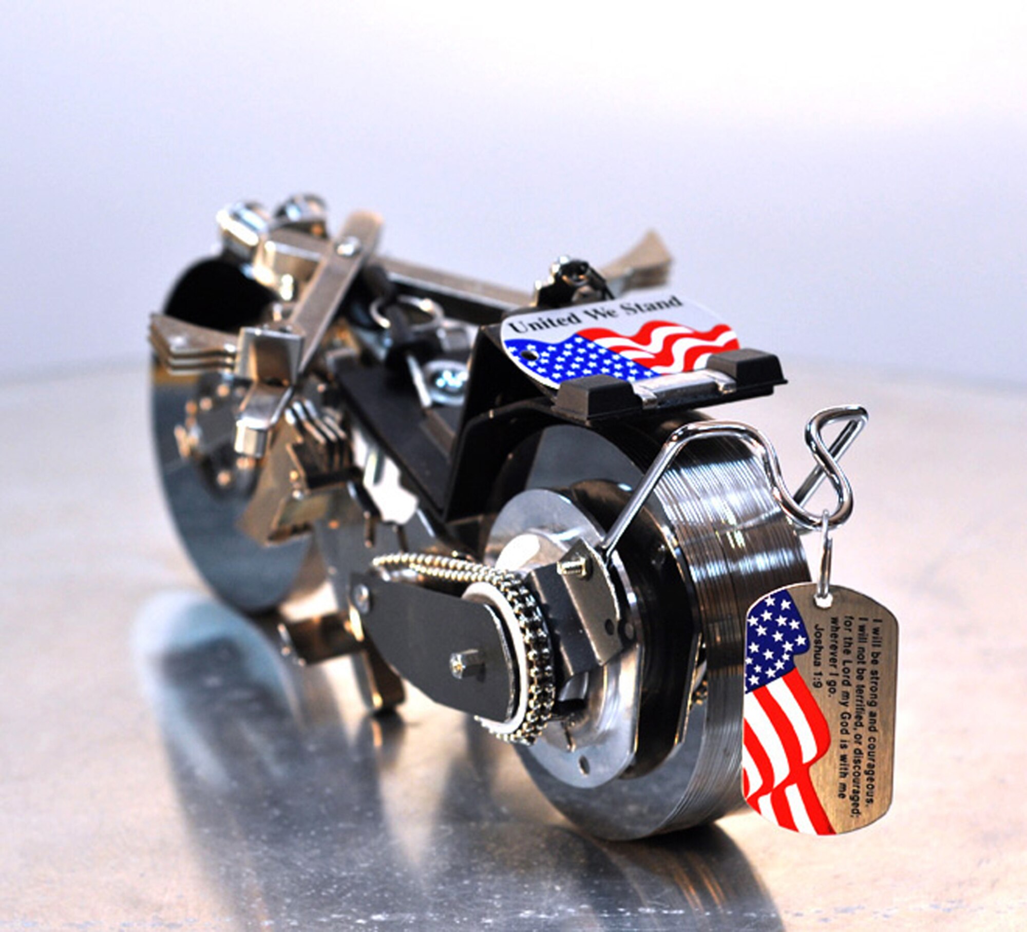 Miguel Rivera created this motorcycle sculpture from old hard drive components. The dog tags were given to him by a Navy chaplain and he added them to the sculpture as a tribute to all servicemembers. Mr. Rivera is a 386th Expeditionary Communications Squadron systems administrator. (Courtesy photo/Miguel Rivera)
