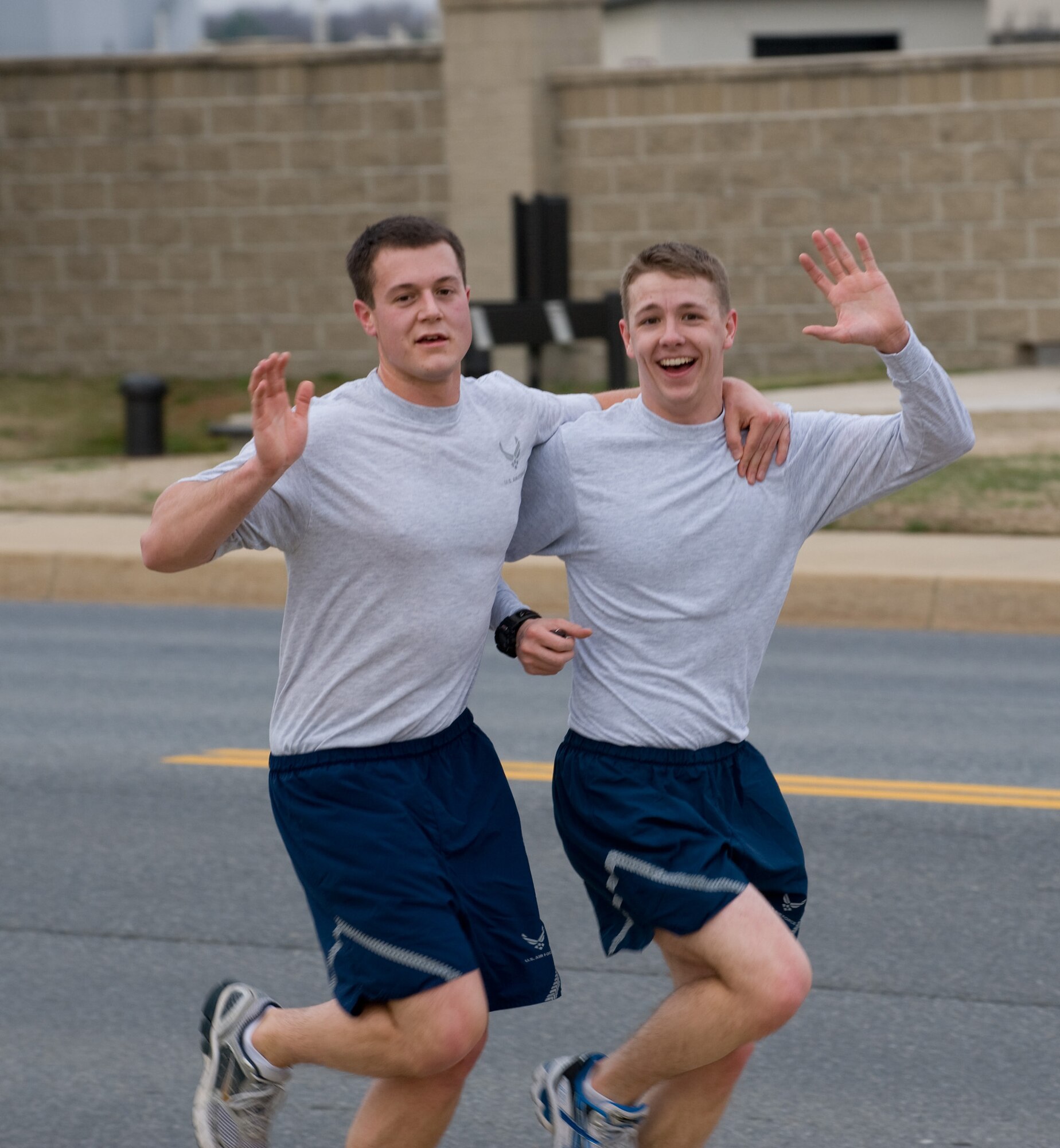 (Left to right) Capt. Matthew Distefano and 1st Lt. Kyle Modell from the 3rd Airlift Squadron spreads holiday cheer during the Warrior Run Dec. 15. (U.S. Air Force photo/ Brianne Zimny)