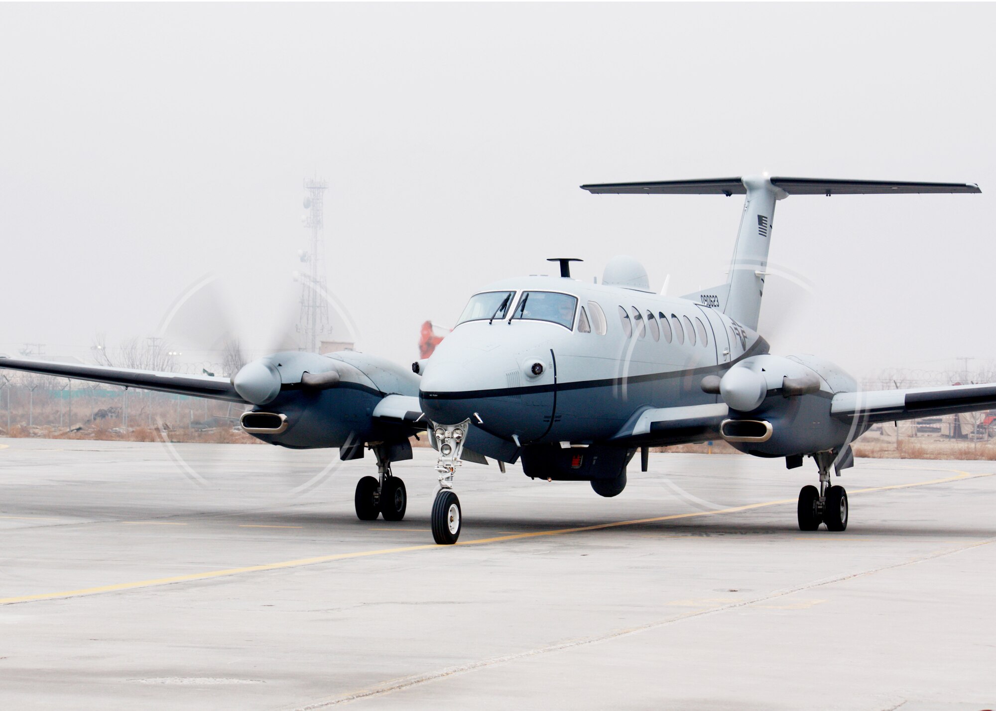Airmen welcomed the first Air Force MC-12 to be based in Afghanistan Dec. 27, 2009. The aircraft brings another capability to Operation Enduring Freedom, because the MC-12 is not just an aircraft, but a complete collection, processing, analysis and dissemination system of Airmen committed to securing Afghanistan and protecting Afghan and coalition lives. (U.S. Air Force photo/Airman 1st Class David Gurley)