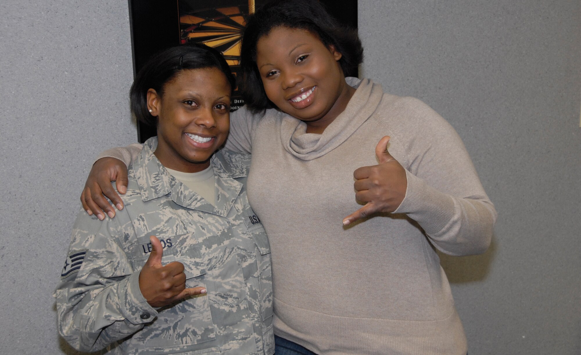 Staff Sgt. Sarethia Lemos, 442nd Fighter Wing education and training specialist, and her sister, Mazie Purdue, have used Air Force discipline and values to improve their relationship and move into the next phase of life. The 442nd Fighter Wing is an Air Force Reserve unit at Whiteman Air Force Base, Mo. (U.S. Air Force photo/Staff Sgt. Kent Kagarise)