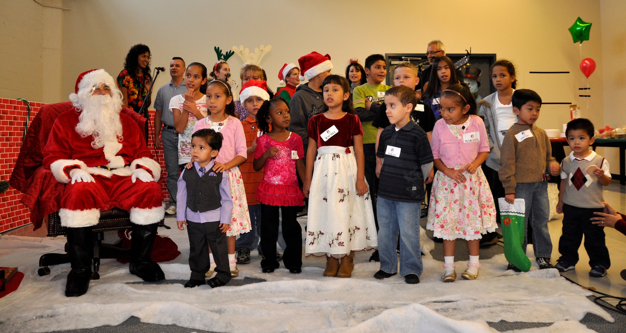 Holiday caroling.  (U.S. Air Force photos by Tech. Sgt. Teresa Bertani)
