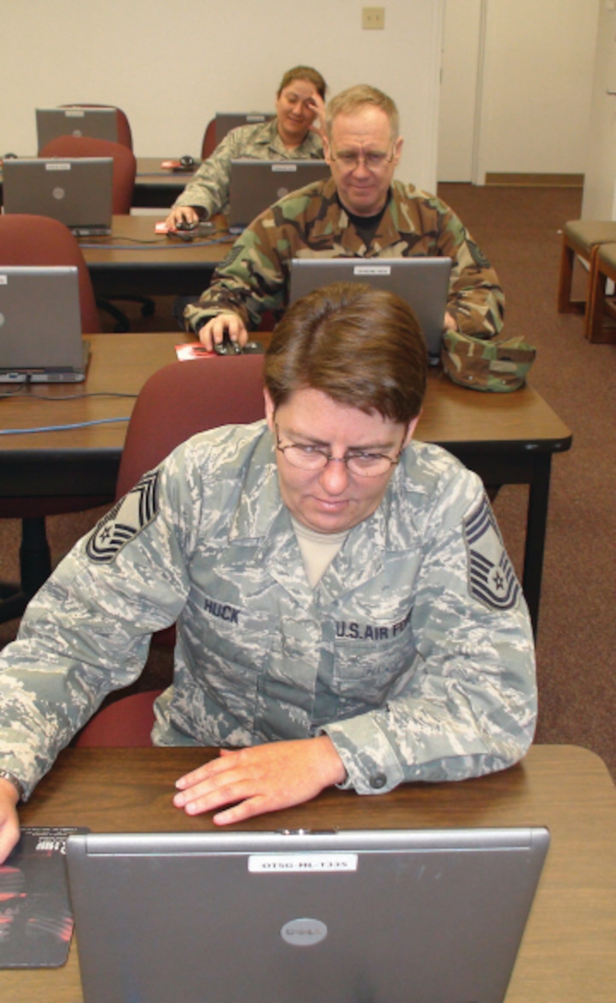Chief Master Sgt. Paula Huck takes the Automated Neuropsychological Assessment at March ARB during the B UTA Dec. 12-13. The ANAM tests for mild traumatic brain injury. (U.S. Air Force photo by Master Sgt. Michael Blair)
