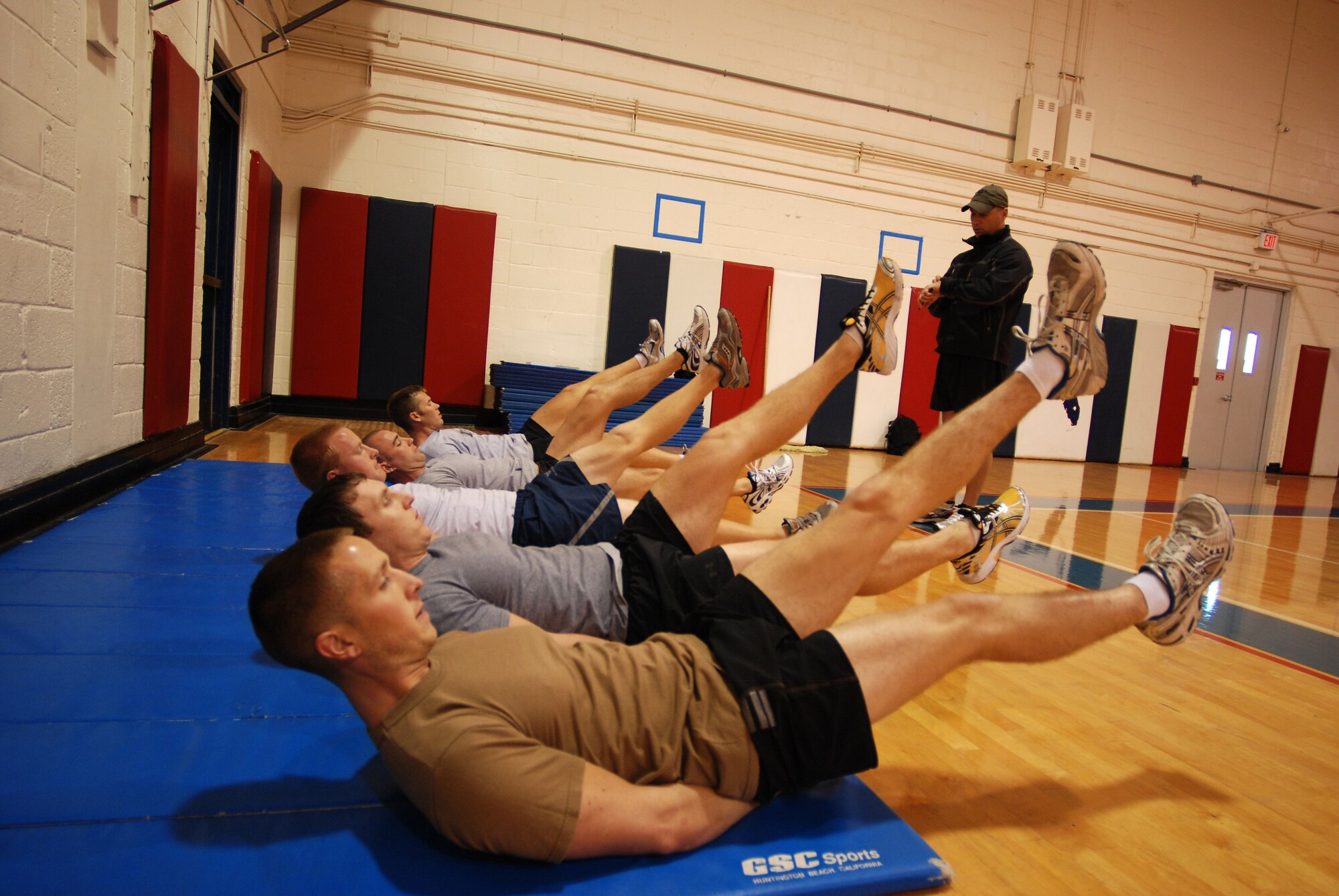 PATRICK AIR FORCE BASE, Fla. - Tech. Sgt. Patrick Dunne, Air Force Reserve Pararescueman, times the flutter kicks during the physical ability and stamina test. Each person must pass this test and attend a board to be accepted into the INDOC training. (U.S. Air Force Photo/Staff Sgt. Leslie Kraushaar)