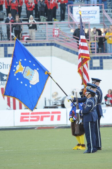Barksdale AFB, La. – Members from Barksdale’s Honor Guard attended the AdvoCare V100 Independence Bowl game Dec. 28 to present the colors during the national anthem. The game was nationally televised on ESPN, with a final score of Georgia 44, Texas A&M 20. (U.S. Air Force photo by Senior Airman Alexandra Longfellow) (RELEASED)
