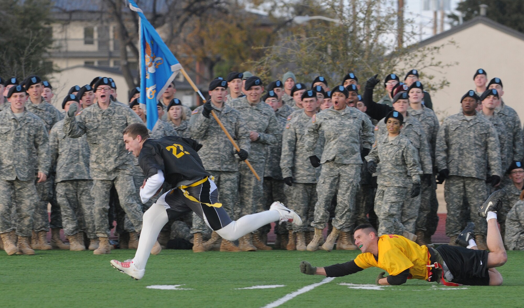 Warrant Officer Todd Tarker, Marine Corps Detachment, misses the flag on an Army player during the 2009 Army-Navy Football game at Goodfellow Air Force Base, Texas, Dec. 4, 2009. (U.S. Air Force Photo/Airman Clayton Lenhardt)