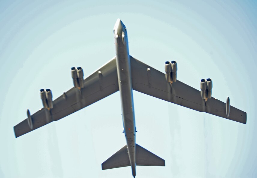 Barksdale AFB, La- A B-52H Stratofortress flew over the audience at the Independence Stadium during the Independence Bowl Dec. 28 following the national anthem. As a special feature the B-52 was carrying the Litening II targeting pod that focused on the Barksdale Honor Guard on the field. The live video feed was integrated into the Independence Bowl Jumbotron. (U.S. Air Force photo by Senior Airman Alexandra Longfellow) (RELEASED)