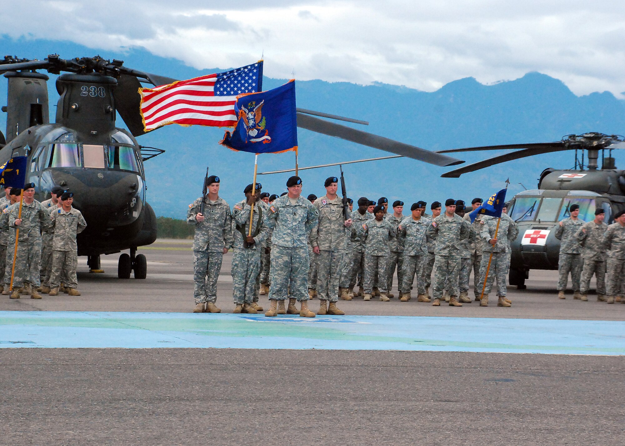 More than 100 1st Battalion, 228th Aviation Regiment Soldiers prepare to participate in the change of responsibility ceremony for incoming Command Sgt. Maj. Lucio DeAnda, 1/228th command sergeant major and outgoing 1/228th Command Sgt. Maj. Carlos Escalera Dec. 29 here. (Photo by U.S. Air Force Staff Sgt. Bryan Franks)