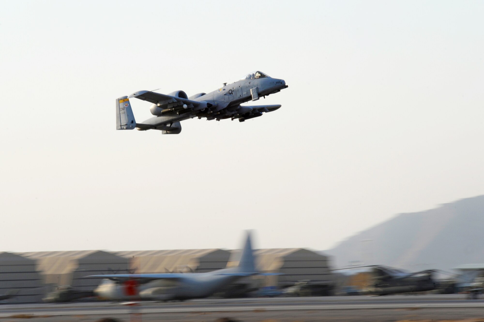 An A-10 Thunderbolt II with the 354th Expeditionary Fighter Squadron takes off at Kandahar Airfield, Afghanistan, Dec. 27, 2009. The A-10 is specifically designed to provide close-air support for U.S. and coalition ground forces. (U.S. Air Force photo/Tech Sgt. Francisco V. Govea II)