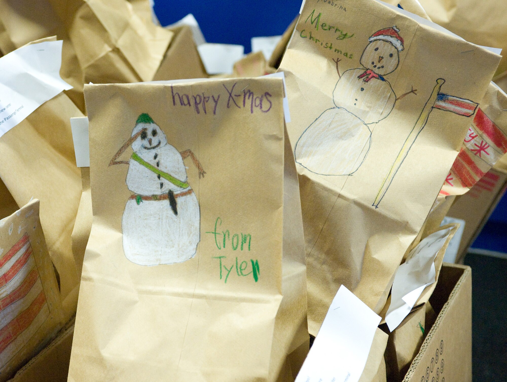Operation Cookie Drop, sponsored by the Dover Chiefs Group, was a way to spread holiday cheer to more than 330 Airmen residing in the dormitories. More than 650 dozen goodies were collected and distributed to Airmen on base. (U.S. Air Force photo/ Brianne Zimny)