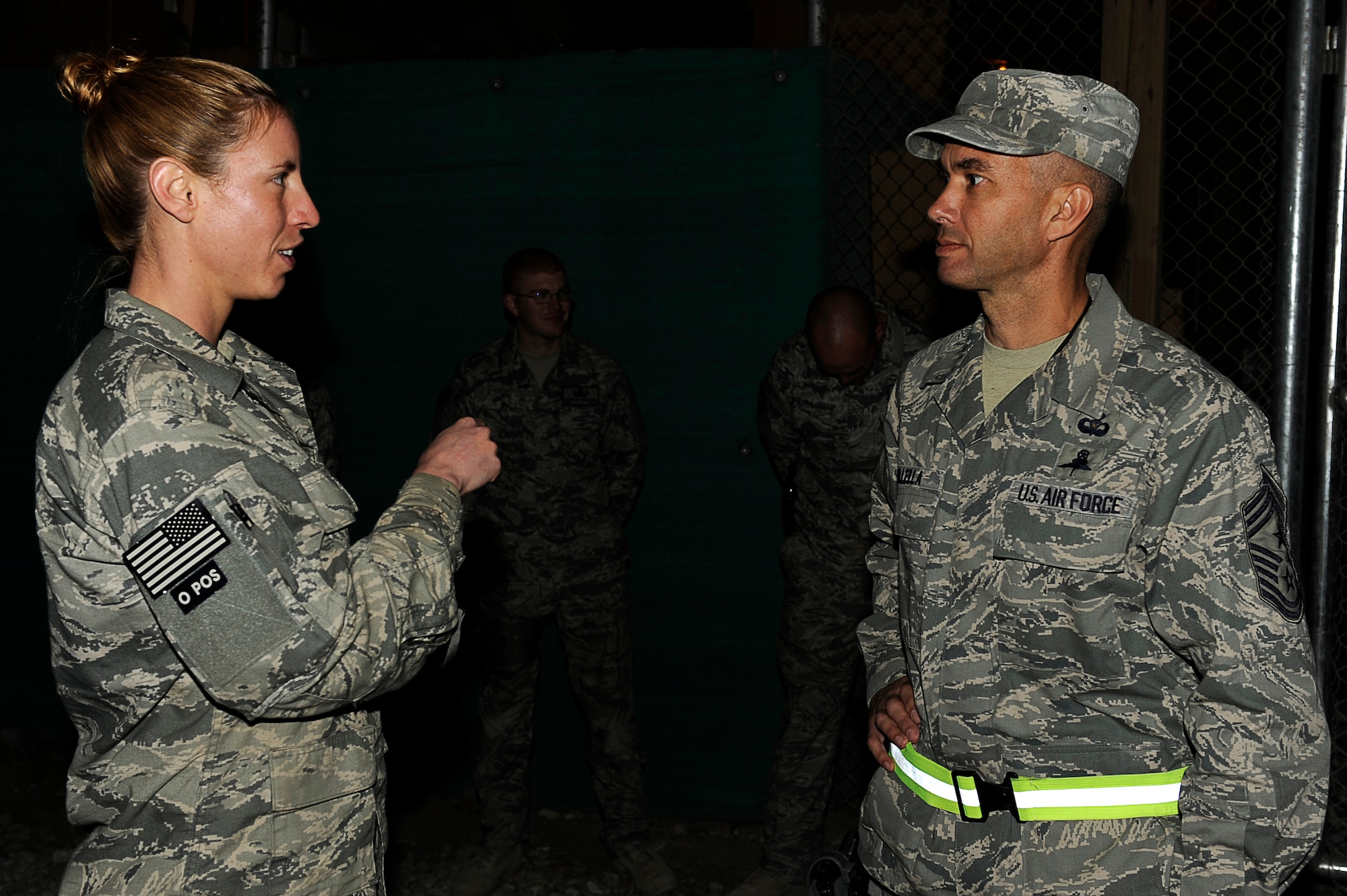 BAGRAM AIRFIELD Afghanistan--U.S. Air Force Staff Sgt. Liz Spradley 755 Air Expeditionary Group, Explosive Ordnance Disposal (EOD), Operation Location Alfa, demonstrates some of EOD's equipment to AFCENT Command Chief Mark Villella during his tour of Dec. 29, 2009. (U.S. Air Force photo by: Tech. Sgt. Jeromy K. Cross)

