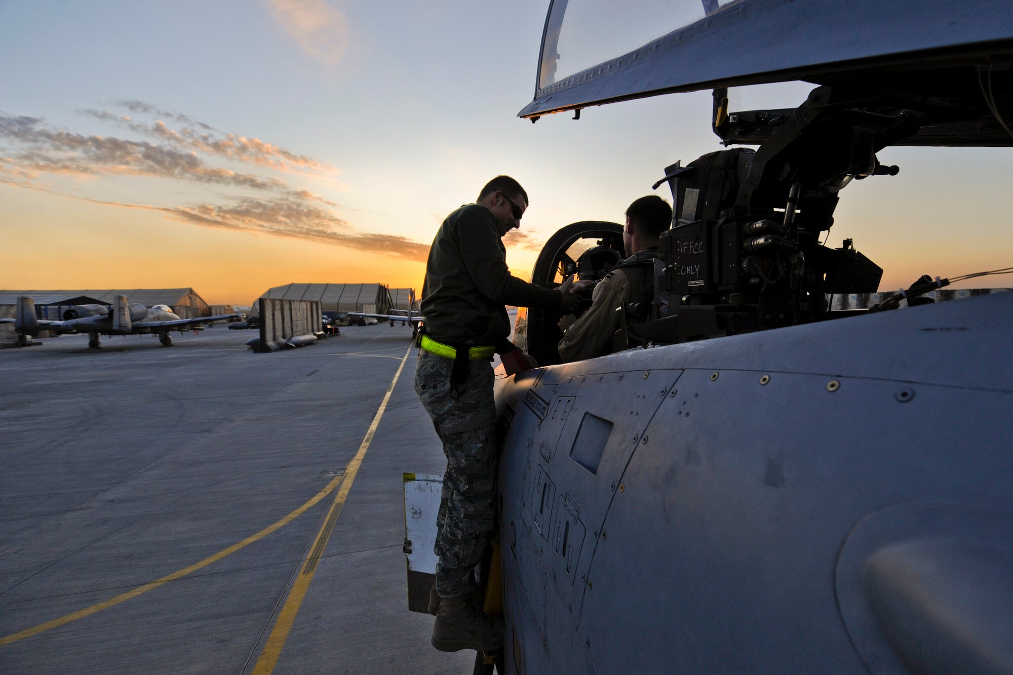 KANDAHAR AIRFIELD, Afghanistan -- A U.S. Air Force crew chief with the 451st Expeditionary Maintenance Squadron conducts a final inspection on an A-10C Thunderbolt II from the 354th Expeditionary Fighter Squadron on Kandahar Airfield, Afghanistan, Dec. 27, 2009. (U.S. Air Force photo/Tech. Sgt. Efren Lopez)