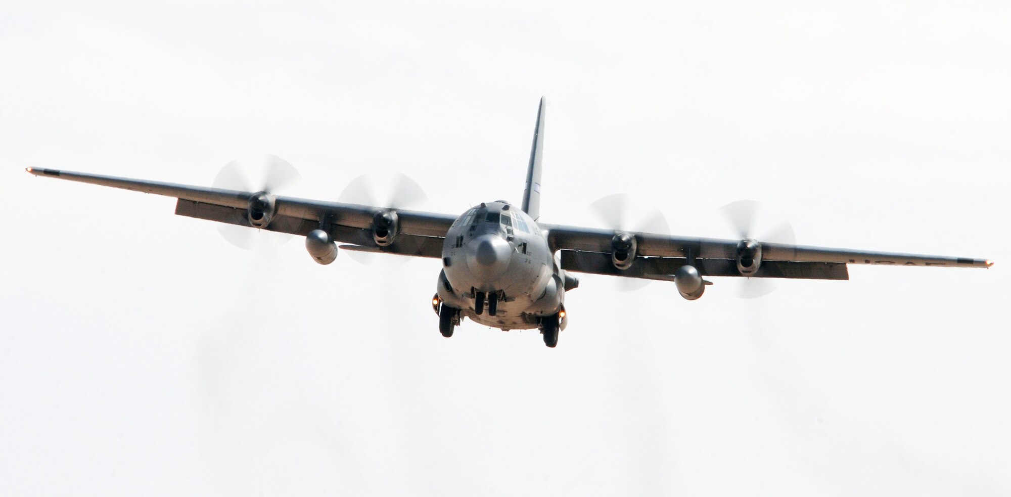 A 737th Expeditionary Airlift Squadron C-130 Hercules prepares for landing at an air base in Southwest Asia. The 737th EAS successfully completed its 10,000th mission of the year on Dec. 23, 2009. (U.S. Air Force photo/Tech. Sgt. Tony Tolley)