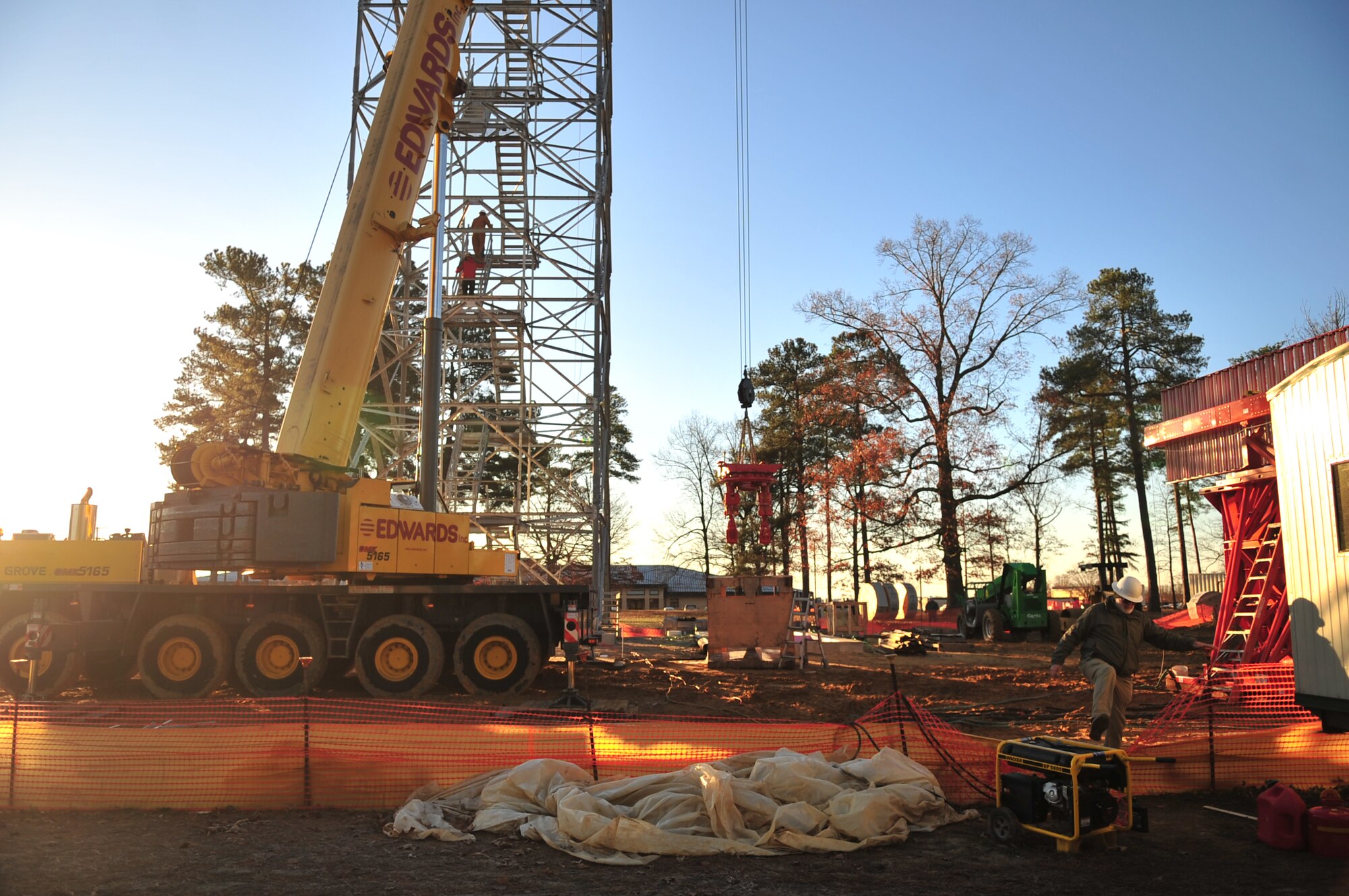 Members of Todd Hamilton Tower Services lift the rotating assembly for the Digital Airport Surveillance Radar on Seymour Johnson Air Force Base, N.C., Dec. 17, 2009. The new DASR will allow air traffic controllers to better manage the airfield by providing a 3-D look into air space. (U.S. Air Force photo/Airman 1st Class Rae Perry) 