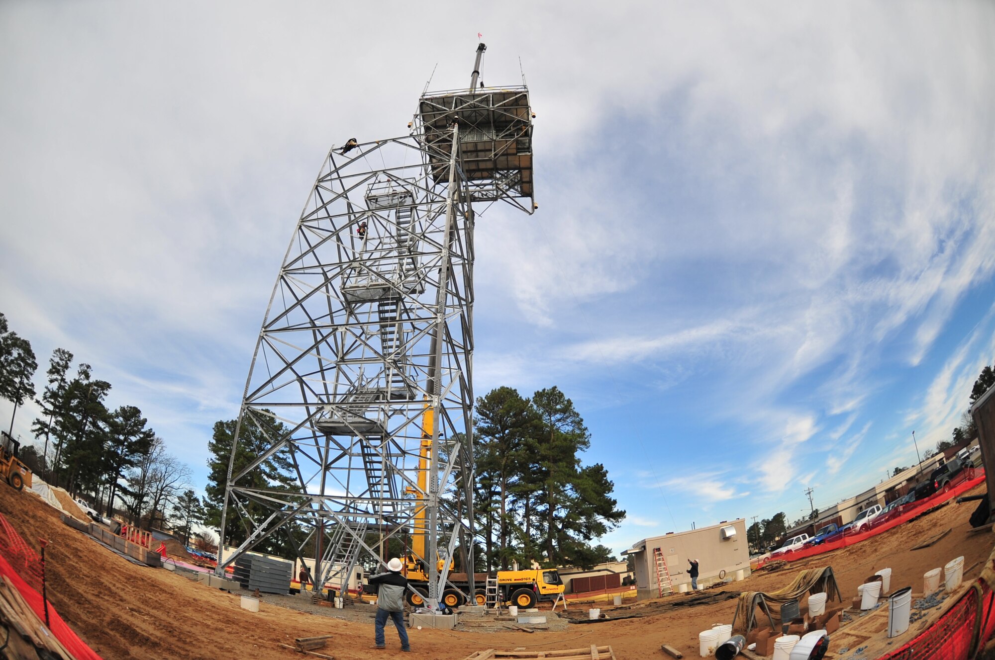 Members of Todd Hamilton Tower Services from Jefferson, Ohio, lift the final level of the Digital Airport Surveillance Radar on Seymour Johnson Air Force Base, N.C., Dec. 16, 2009. The crew is lead by Todd Hamilton, a former Army Ranger. (U.S. Air Force photo/Airman 1st Class Rae Perry)