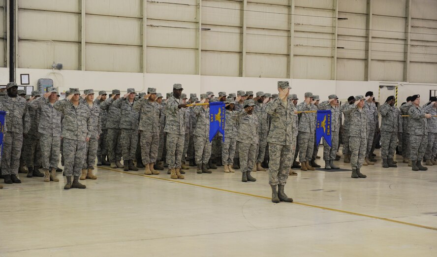 MOODY AIR FORCE BASE, Ga. -- Members of the 23rd Mission Support Group salute Col. Mark Ruse, their new commander, during the assumption of command ceremony here Dec. 18. His role as the 23rd MSG commander will be to lead the group as they train, equip and deploy personnel support forces to build, protect and sustain air bases worldwide for combat air operations. (U.S. Air Force photo by Airman 1st Class Benjamin Wiseman)