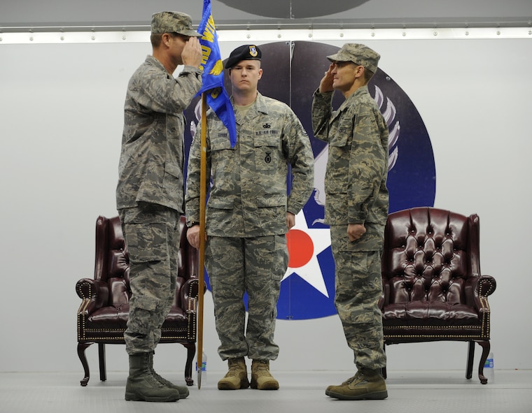 MOODY AIR FORCE BASE, Ga. -- Col. Mark Ruse, 23rd Mission Support Group commander, salutes Col. Gary Henderson, 23rd Wing commander, after taking formal command of the 23rd Mission Support Group during the assumption of command ceremony here Dec. 18. Colonel Ruse has leadership experience at the wing level as well as Headquarters Air Combat Command and Air Mobility Command levels. (U.S. Air Force photo by Airman 1st Class Benjamin Wiseman)