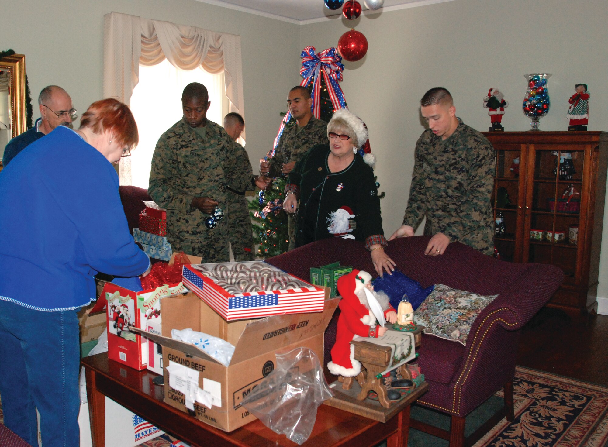 Volunteers decorated the house for the annual wing commander’s holiday reception and a dinner for Team March members who will be working on Christmas. (U.S. Air Force photo by Staff Sgt. Megan Crusher)