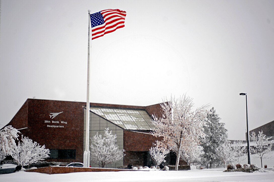 ELLSWORTH AIR FORCE BASE, S.D.-- The 28th Bomb Wing was hit with a winter storm, Dec. 23. For road condition updates and reporting situations, call (605) 385-ROAD (7623) or visit the Ellsworth Air Force Base Web site at www.ellsworth.af.mil. (U.S. Air Force photo/Airman 1st Class Matthew Flynn)