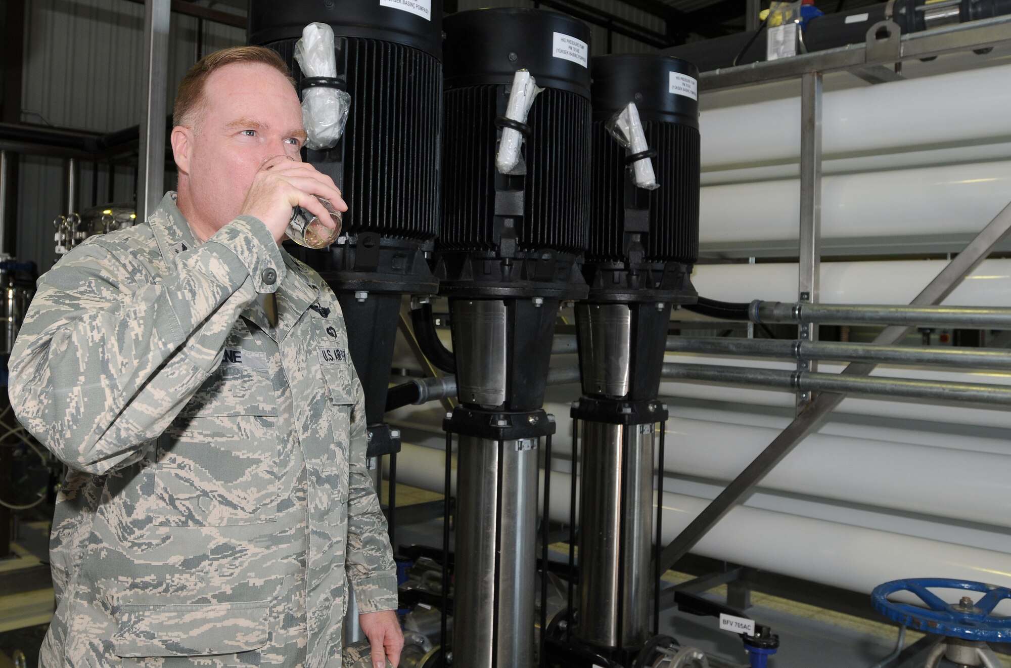 Col. Eric Beene, the 39th Air Base Wing commander, takes the first drink of “ultra pure” water from the new Reverse Osmosis system, Wednesday, Dec. 30, 2009 at Incirlik’s water treatment plant.  The purified water from the Reverse Osmosis system will be available base wide Jan. 4, 2010. (U.S. Air Force photo/Senior Airman Ashley Wood)