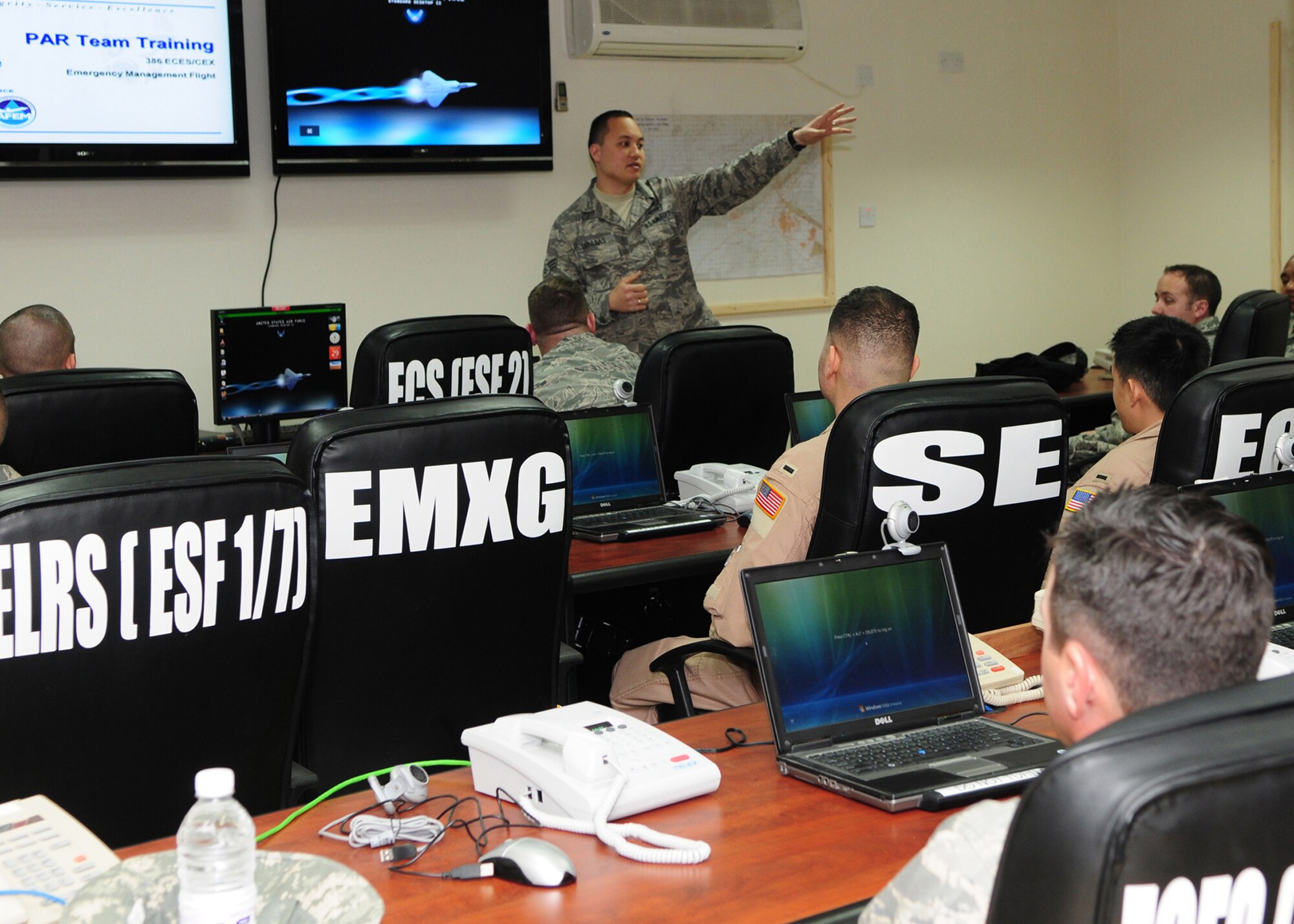 SOUTHWEST ASIA  -- Senior Airman Alexander Ubiadas, 386th Expeditionary Civil Engineer Squadron emergency management flight instructor, covers post attack reconnaissance team expectations with team members during a training class here Dec. 29, 2009. Airman Ubiadas is stationed at Hickam Air Force Base, Hawaii. (U.S. Air Force photo/Staff Sgt. Lakisha A. Croley)