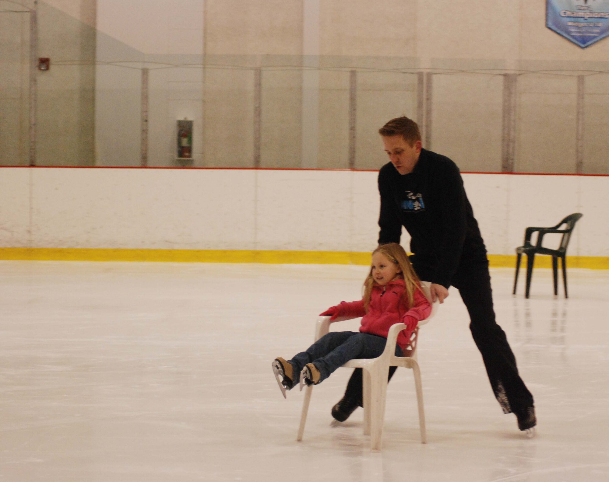 The children of March Air Reserve Base service members joined the performers of Disney on Ice Worlds of Fantasy for a free skating party at Center Ice in Ontario, Calif., Dec. 30, 2009.  After they skated with the performers, the children posed for pictures with Minnie and Mickey Mouse.  Many of the children will attend the show, which runs at Citizens Business Bank Arena in Ontario from Dec. 30 to Jan. 3, with complementary tickets.