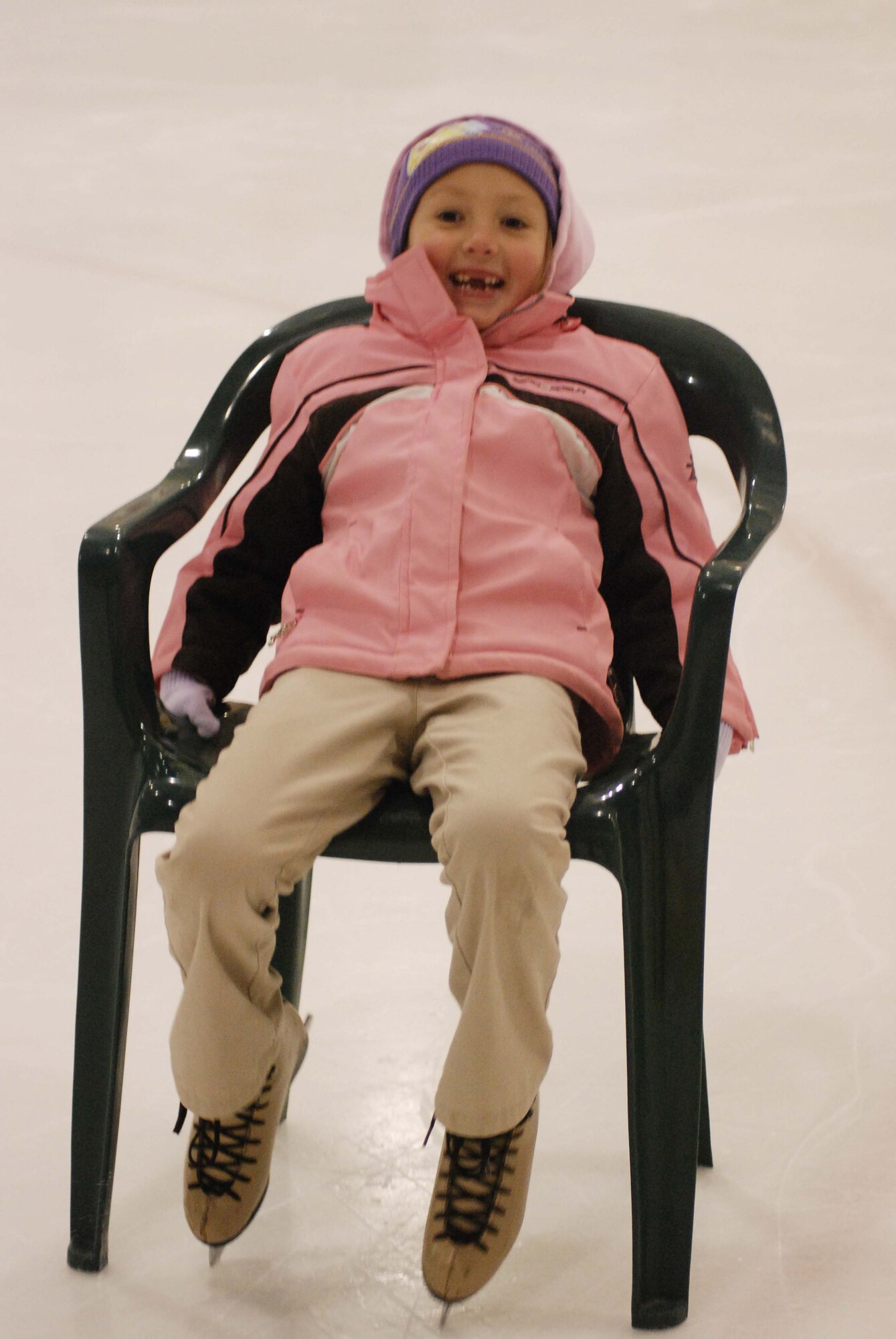 The children of March Air Reserve Base service members joined the performers of Disney on Ice Worlds of Fantasy for a free skating party at Center Ice in Ontario, Calif., Dec. 30, 2009.  After they skated with the performers, the children posed for pictures with Minnie and Mickey Mouse.  Many of the children will attend the show, which runs at Citizens Business Bank Arena in Ontario from Dec. 30 to Jan. 3, with complementary tickets.