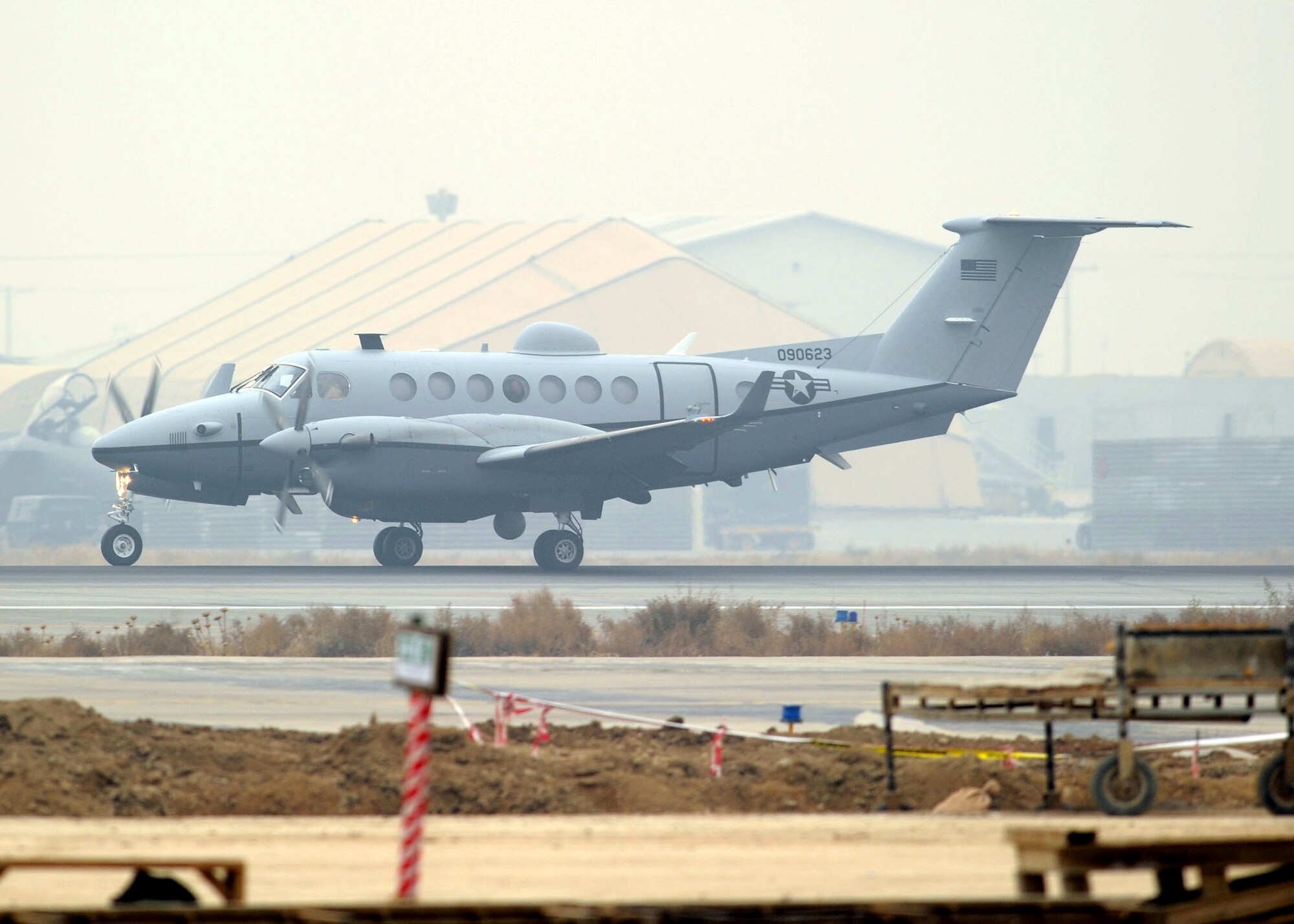 A MC-12 landed at Bagram Airfield, Afghanistan, Dec. 27, 2009, bringing another capability to Operation Enduring Freedom. The MC-12 is not just an aircraft, but a complete collection, processing, analysis and dissemination system. (U.S. Air Force photo/Senior Airman Felicia Juenke)