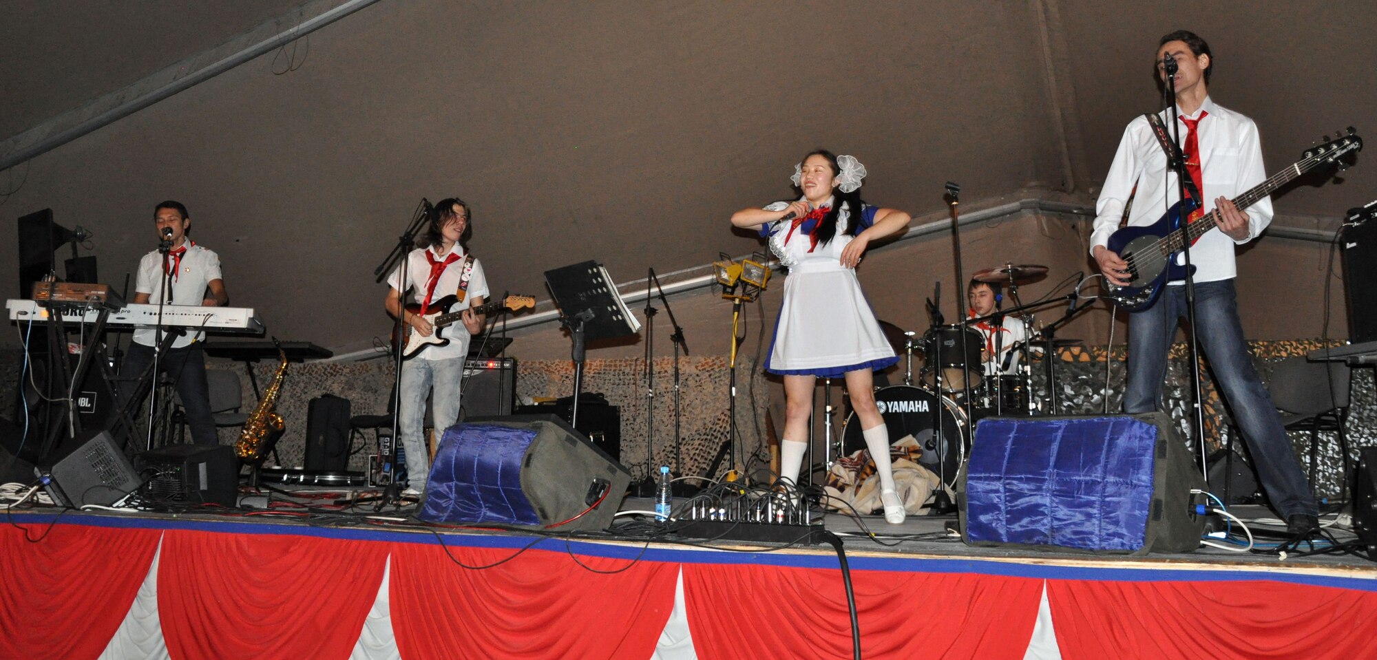 TRANSIT CENTER AT MANAS, Kyrgyzstan – Arttec, a local band, performs at Pete’s Place here Dec. 30, 2009. The 376th Expeditionary Force Support Squadron hosted this top-rated band from Bishkek, Kyrgyzstan. Frequent morale events occur here to entertain Airmen, Soldiers, Sailors, and Marines in transit who are deployed in support of Operation Enduring Freedom and the International Security Assistance Force helping to promote regional stability in Central Asia. (U.S. Air Force photo/ Staff Sgt. Carolyn Viss)