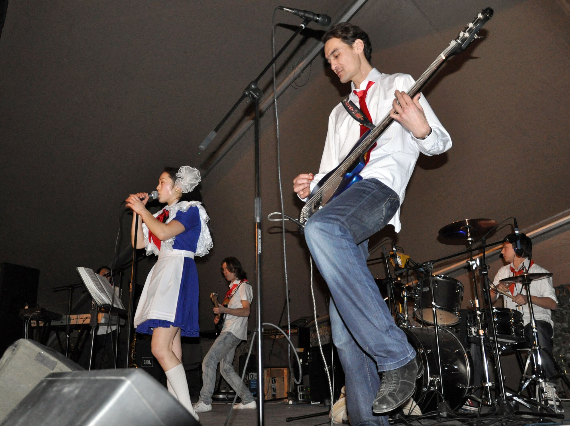 TRANSIT CENTER AT MANAS, Kyrgyzstan – Arttec, a local band, performs at Pete’s Place here Dec. 30, 2009. The 376th Expeditionary Force Support Squadron hosted this top-rated band from Bishkek, Kyrgyzstan. Frequent morale events occur here to entertain Airmen, Soldiers, Sailors, and Marines in transit who are deployed in support of Operation Enduring Freedom and the International Security Assistance Force helping to promote regional stability in Central Asia. (U.S. Air Force photo/ Staff Sgt. Carolyn Viss)