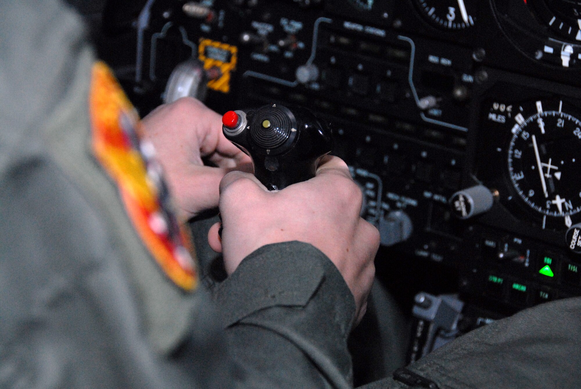 Thirteen-year-old Wyatt Maurer, adjusts the control stick of the 303rd Fighter Squadron's A-10 Thunderbolt II flight simulator during his "pilot for a day" experience at the 303rd Jan. 11.  Not only was Wyatt  treated to a simulator "ride" but also received a tour of an actual A-10 and a day in the life of an A-10 pilot.  The visit was made possible by the Greater Kansas City chapter of the Dream Factory, which arranges special memories for children with serious or chronic medical conditions.  The 303rd is part of the 442nd Fighter Wing, an Air Force Reserve Command unit based at Whiteman Air Force Base, Mo.  (U.S. Air Force photo/Staff Sgt. Kent Kagarise)