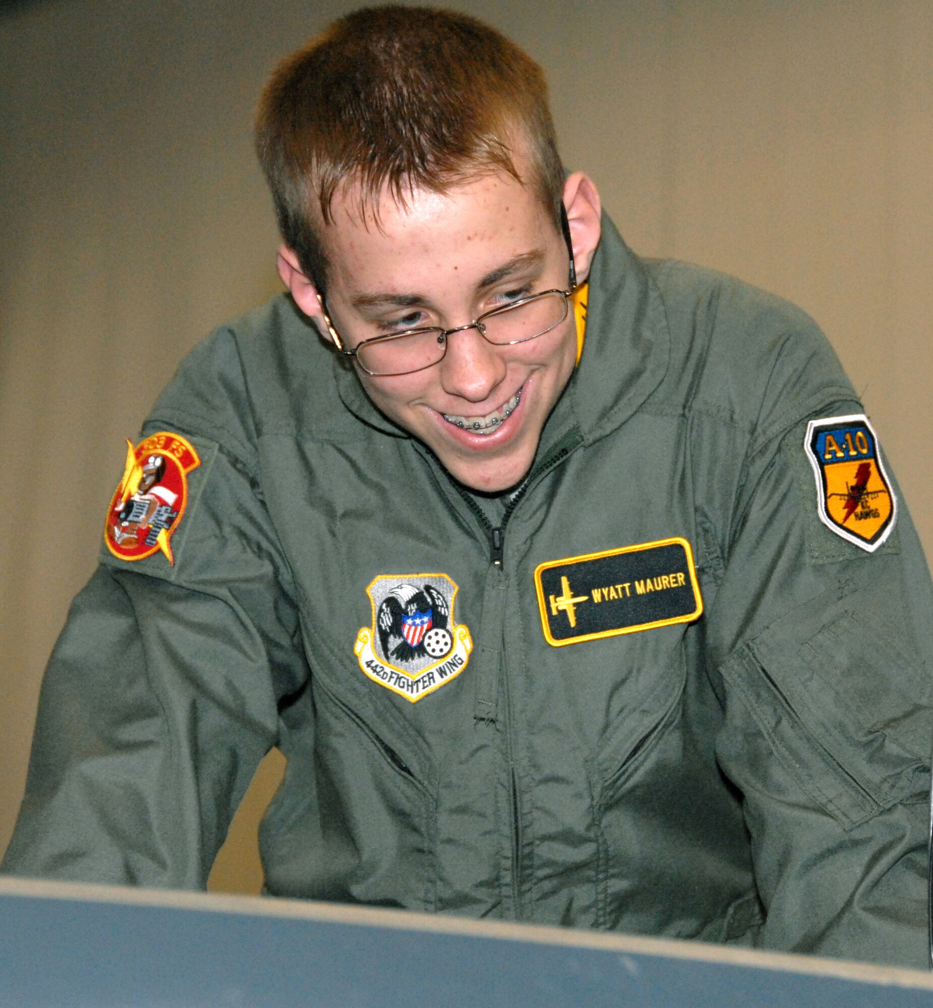 Thirteen-year-old Wyatt Maurer takes a look inside a T-38 Talon during his "pilot for a day" experience at the 303rd Fighter Squadron Jan. 11.  Wyatt was treated to a simulator "ride" and received a tour of an actual A-10 and T-38 as he experienced a day in the life of an A-10 pilot.  The visit was made possible by the Greater Kansas City chapter of the Dream Factory, which arranges special memories for children with serious or chronic medical conditions.  The 303rd is part of the 442nd Fighter Wing, an Air Force Reserve Command A-10 unit based at Whiteman Air Force Base, Mo.  (U.S. Air Force photo/Maj. David Kurle)