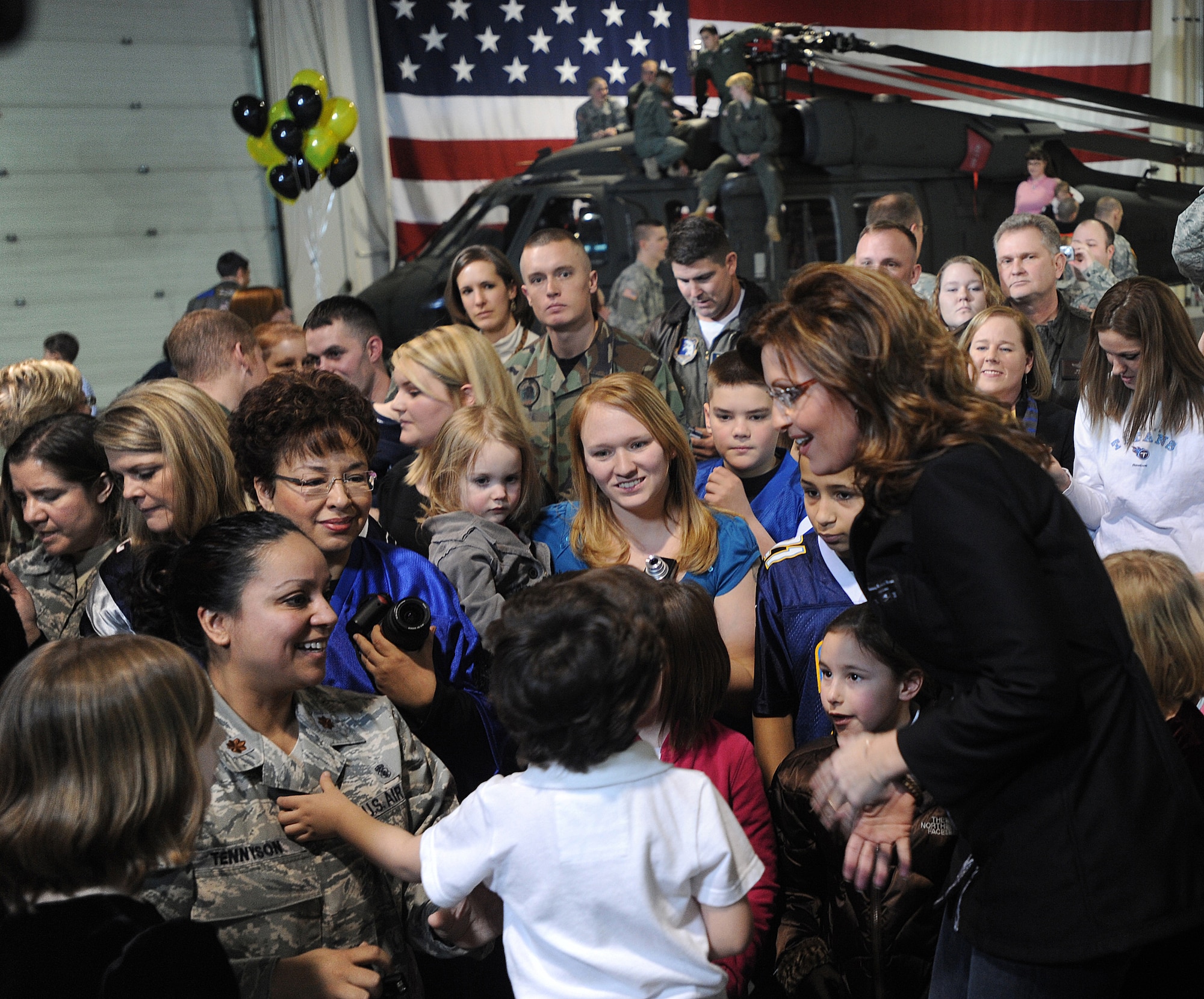 FORT RICHARDSON, Alaska -- Alaska Gov. Sarah Palin greets Air Force Maj. Ofelia Tennyson after her Super Bowl commercial was shot Jan. 25, 2009. Governor Palin was highlighting the importance of family and the military in the United States. (U.S. Air Force photo/Airman 1st Class Kristin High) 