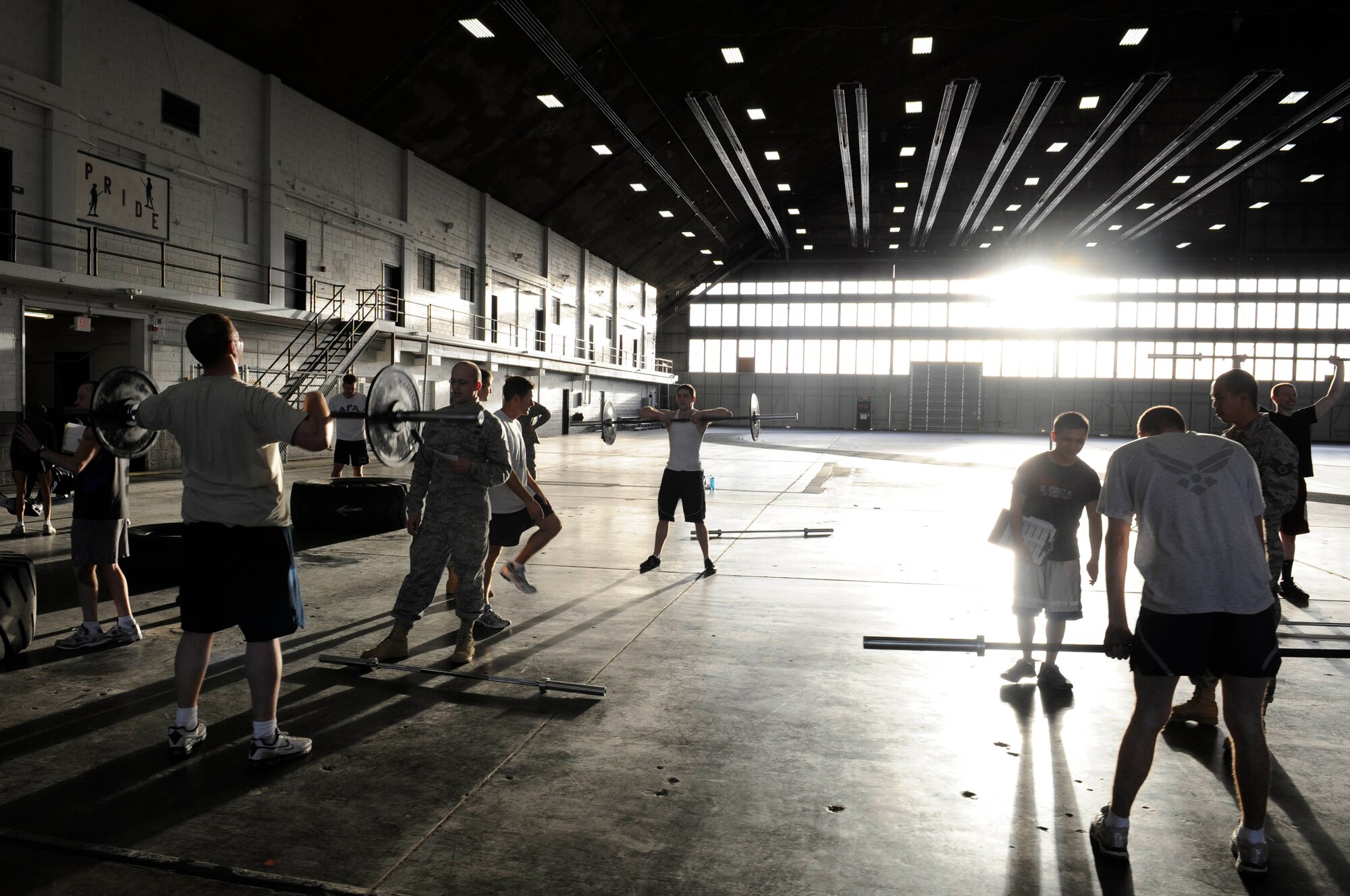 Ellsworth Airmen participate in Fight Gone Bad crossfit tournament here, Jan. 30. Twenty-Nine Airmen participated in wall ball, box jumps, deadlift high-pulls, push presses and row machine exercises in the competition. The goal of the tournament is to promote physical fitness amongst Ellsworth Airmen. (US Air Force photo/Airman 1st Class Corey Hook)