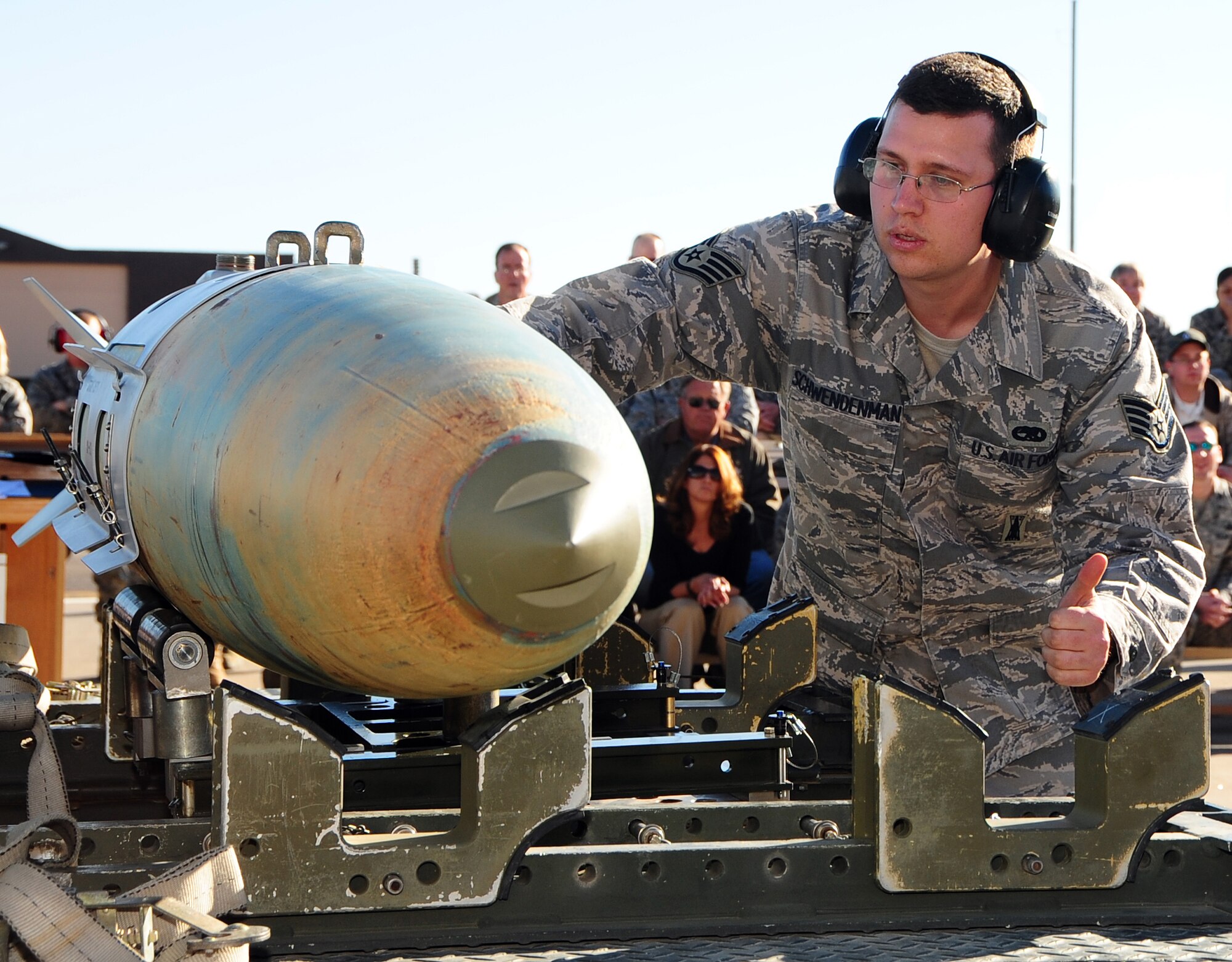 Staff Sgt. Brandon Schwendenman prepares a bomb to be loaded on an F-22A Raptor while competing in the Load Crew or the Yera competition Jan. 30 at Holloman Air Force Base, N.M. Sergeant Schwendenman works for the 49th Aircraft Maintenance Squadron as a 7th Weapons 1 Man Loadcrew Chief. (U.S. Air Force photo/Tech. Sgt. Chris Flahive)