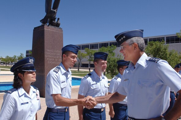 Lt. Gen. John Regni, the Air Force Academy's superintendent, greets cadets.  General Regni will retire from active duty later this year.  He is the Academy's 17th superintendent.  (U.S. Air Force photo)