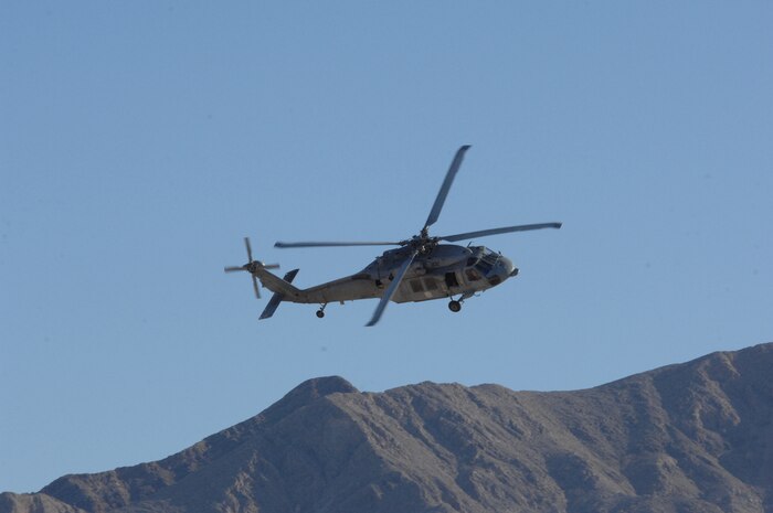 NELLIS AIR FORCE BASE, Nev. – A Navy HH-60 from Helicopter Support Combat Squadron 85, North Island, San Diego, Calif., circles around to its landing pad before landing from a mission here Jan. 29 for RED FLAG 09-2.  RED FLAG is a multinational exercise providing a realistic environment to practice combat scenarios.  The experience gained during the exercise is vital to the survival of the pilots in combat. 