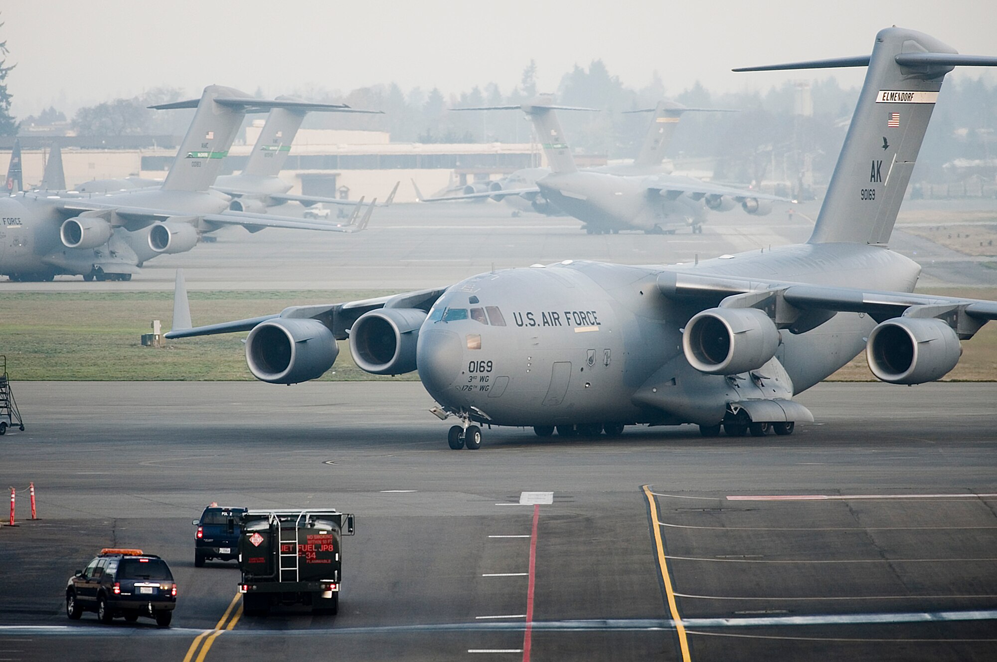 A C-17 Globemaster III, like this one, and other aircraft are being moved from Elmendorf Air Force Base, Alaska, to McChord AFB, Wash.,  due to increased volcanic activity from Mount Redoubt a volcano located approximately 100-miles southwest of Elmendorf AFB. (U.S. Air Force photo/Abner Guzman) 
