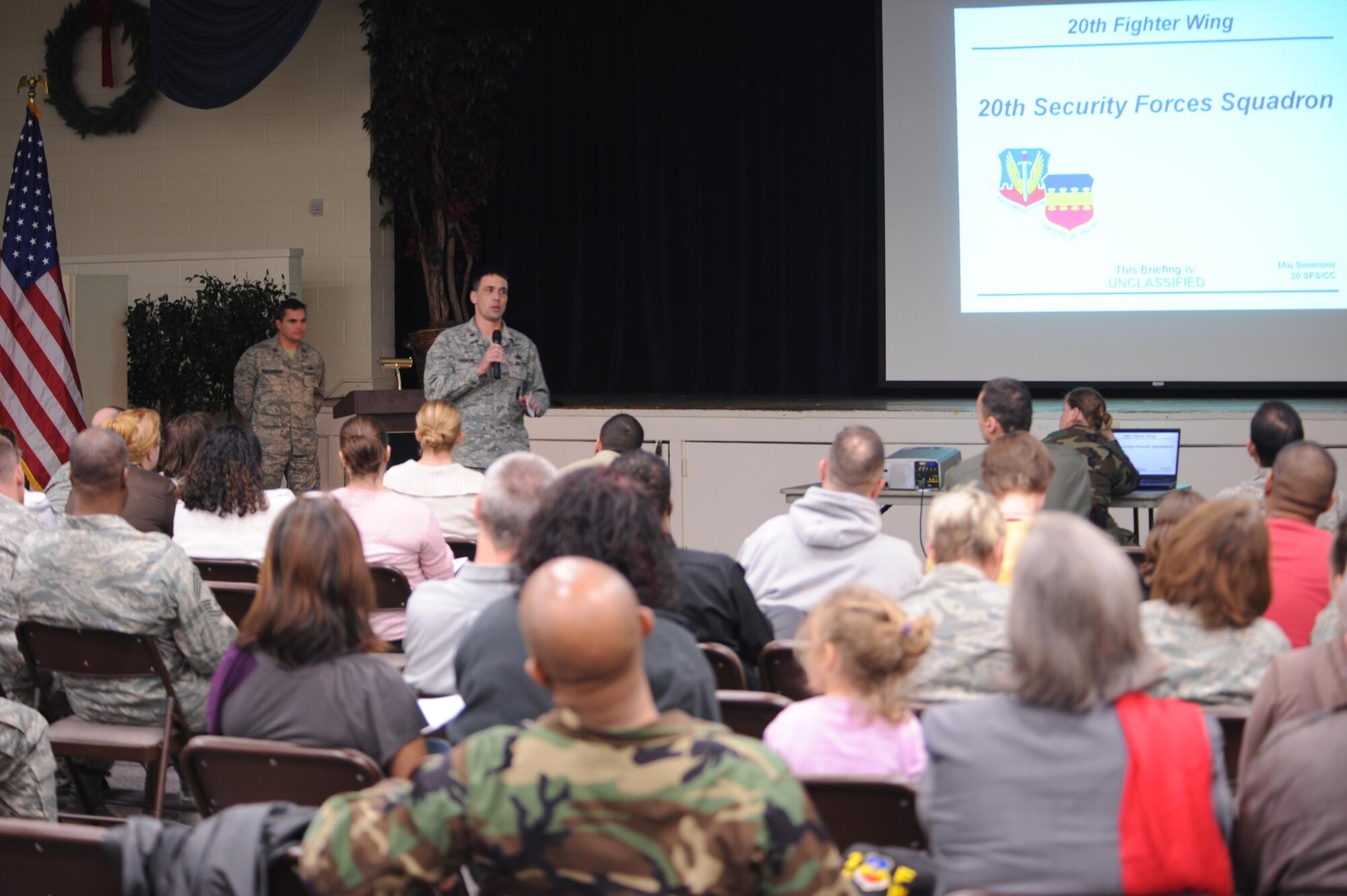 SHAW AIR FORCE BASE, S.C.-- Maj. Timmothy Simmons, 20th Security Forces commander, speaks to military families during a town hall meeting at the Community Center, Jan. 29. The town hall meeting is a gathering of Shaw members to learn and ask questions about upcoming events around the base.  (U.S. Air Force photo/Senior Airman William Coleman)
