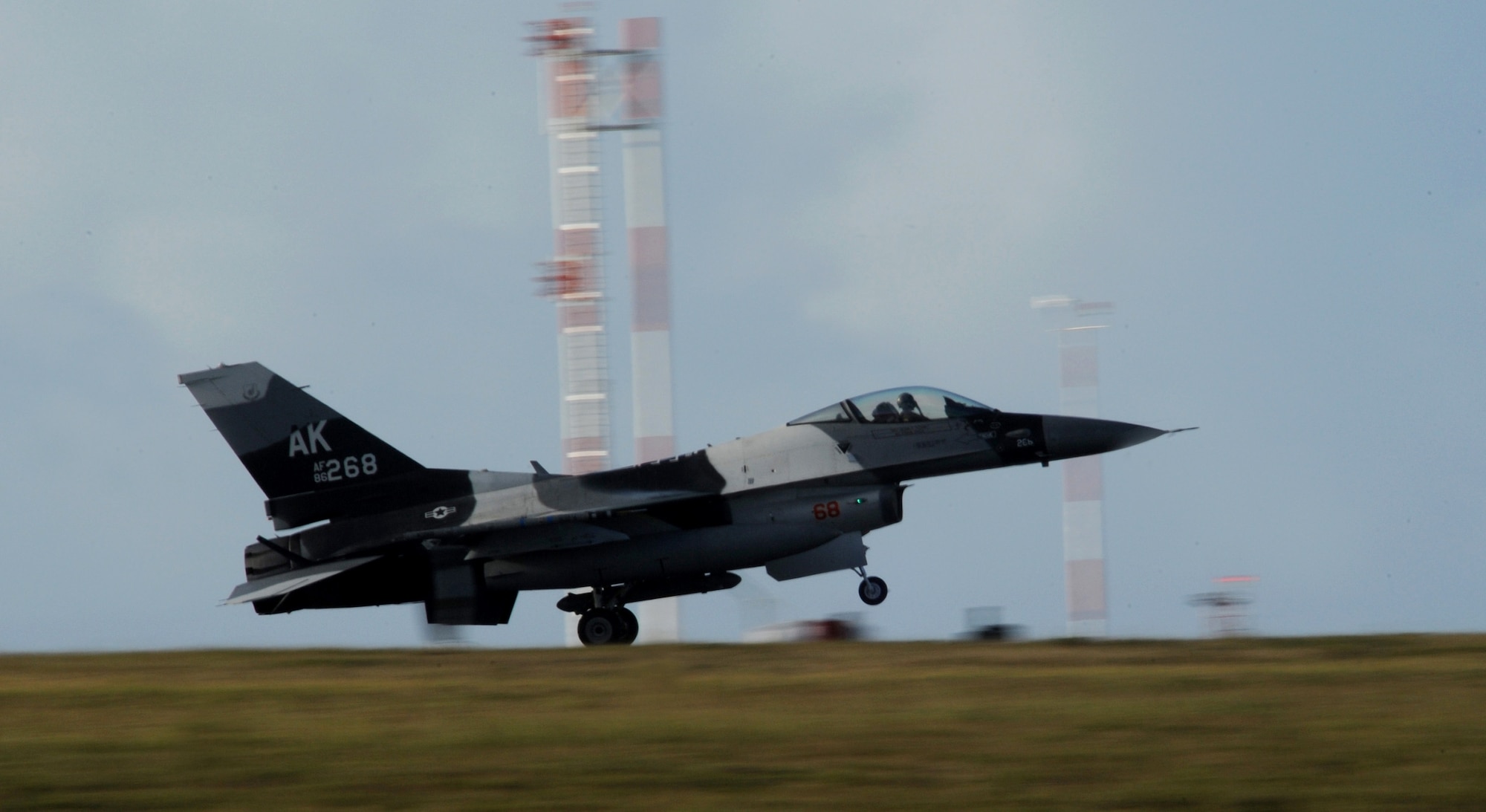 An F-16 Fighting Falcon 18th Aggressor Squadron, Eielson Air Force Base, Alaska, lands at Andersen AFB, Guam on Jan. 31 for exercise Cope North 09-1 from 2-13 Feb. Japan Air Self Defense Force F-2s from the 6th Squadron, Tsuiki Air Base and E-2Cs from the 601st Squadron, Misawa Air Base will join forward deployed USAF  F-16 Fighting Falcons from the 18th Aggressor Squadron, Eielson AFB Alaska, B-52 Stratofortress' currently deployed to Andersen AFB, Guam from the 23rd Expeditionary Bomb Squadron, and Navy EA-6B from VAQ-136 Carrier Air Wing Five, Atsugi, Japan will participate in this year's exercise with a focus on interoperability.(U.S. Air Force photo/ Master Sgt. Kevin J. Gruenwald) released      