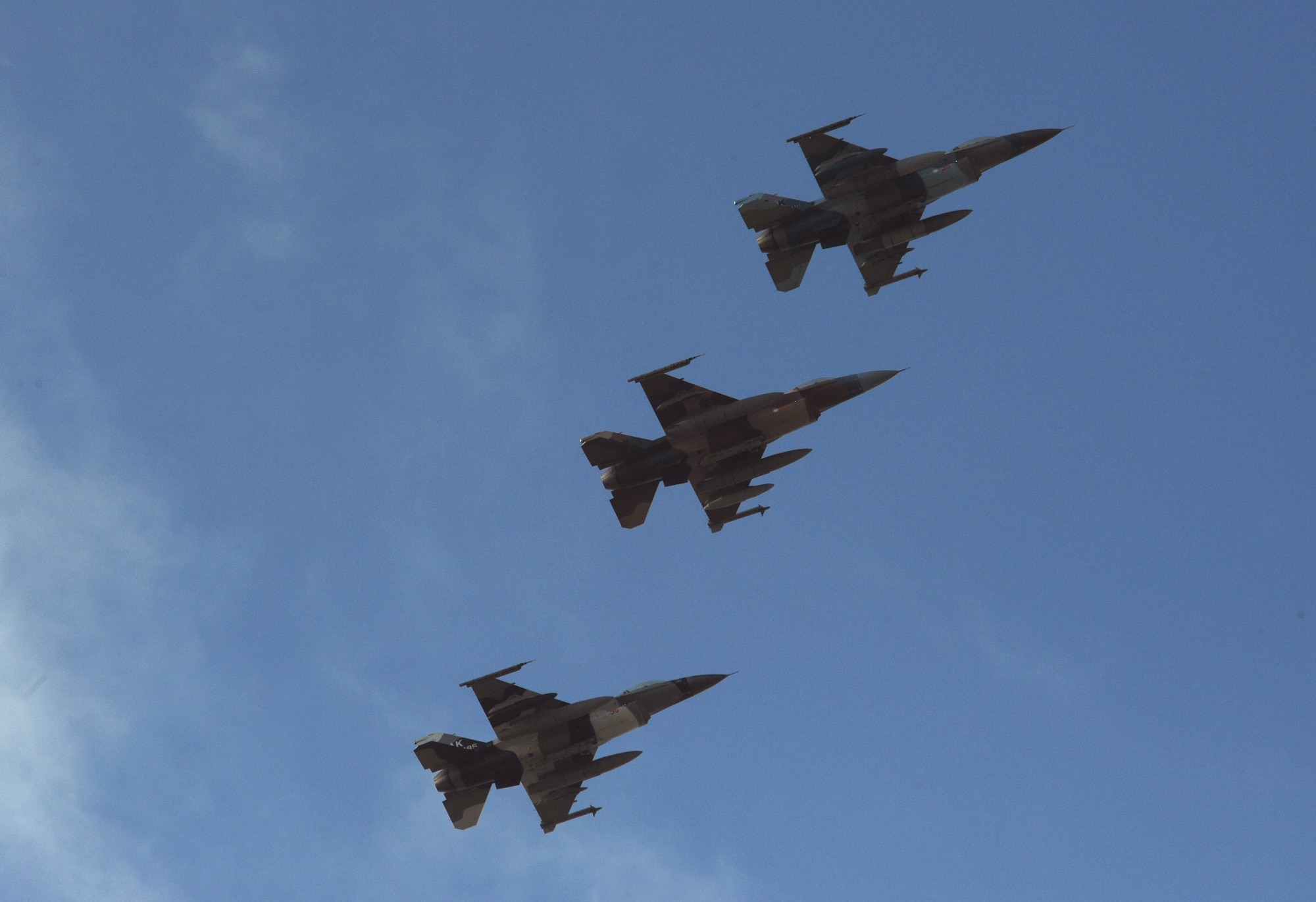 A 3-ship of F-16 Fighting Falcons, 18th Aggressor Squadron, Eielson Air Force Base, Alaska, make an arrival approach over Andersen AFB, Guam for exercise Cope North 09-1, Jan. 31. Units from the U.S. Air Force, and the Japan Air Self Defense Force will participate in exercise Cope North at Andersen AFB, Guam from 2-13 Feb.  Cope North 09-1 is the first iteration of a regularly scheduled joint and bilateral exercise and is part of the on-going series of exercises designed to enhance air operations in defense of Japan. 
(U.S. Air Force photo/ Master Sgt. Kevin J. Gruenwald) released






















  












 











































  












 

























