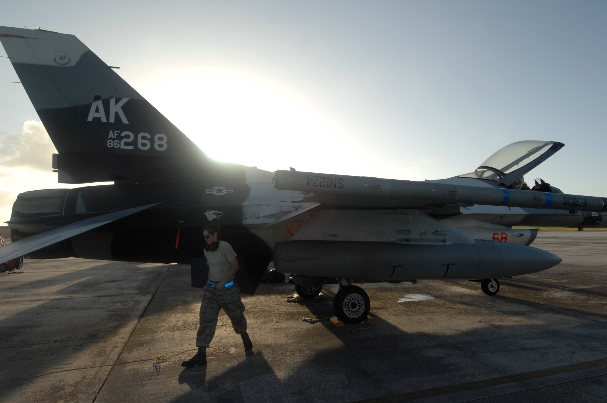 Senior Airman Sydney Reynolds, crew chief  performs post flight maintenance on an F-16 Fighting Falcon, 18th Aggressor Squadron, Eielson Air Force Base, Alaska, after landing Jan. 31, at Andersen AFB, Guam for exercise Cope North 09-1. The Cope North exercise is one of the longest-running series of exercises in the Pacific theater.  Since the first Cope North exercise in 1978, thousands of American and Japanese personnel have honed skills that are vital to maintaining a high level of readiness.  The exercise has been in the planning stages for several months and bears no connection to any real world events.  This will be the tenth time the United States and Japan have held a Cope North exercise on Guam, and it will be the fourth time that the JASDF will use live ordnance. Airman Reynolds is assigned to the 354th Aircraft Maintenance Squadron, Eielson AFB Alaska. 

(U.S. Air Force photo/ Master Sgt. Kevin J. Gruenwald) released





















  












 











































  












 

























