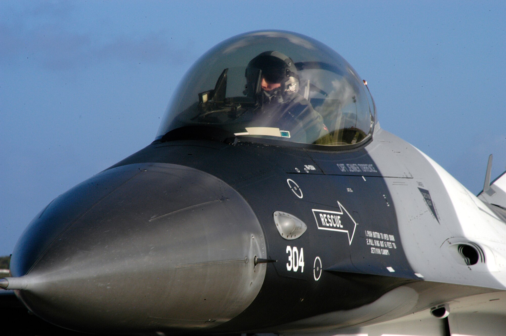 Maj. Ethan Myers,an 18th Aggressor Squadron pilot,  taxis after arriving at Andersen Air Force Base for Cope North 09-1 Jan. 31.  Ten F-16 Aggressors from Eielson Air Force Base, Alaska,  are scheduled participate in Exercise Cope North 09-1, a regularly scheduled exercise scheduled for Feb.2-13 that is designed to enhance U.S. and Japanese air operations in defense of Japan.  This is the first itme Aggressors have particiapted in this exercise. (U.S. Air Force photo by Senior Airman Ryan Whitney)
