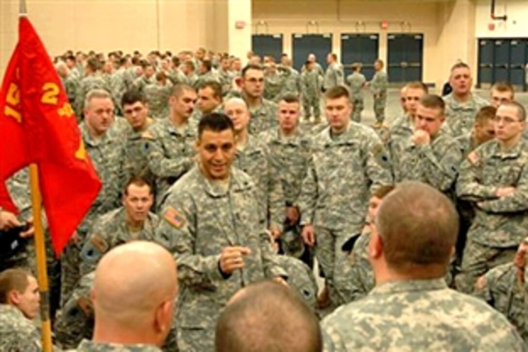 U.S. Army Sgt. Maj. Euripides Perez, an Indiana National guardsman assigned to 2nd Battalion, 150th Field Artillery, briefs soldiers before entering Lucas Oil Stadium during the homecoming celebration in Indianapolis, Ind., January 31, 2009. Indiana National Guard troops were honored for supporting the Global War on Terror in 2008. 