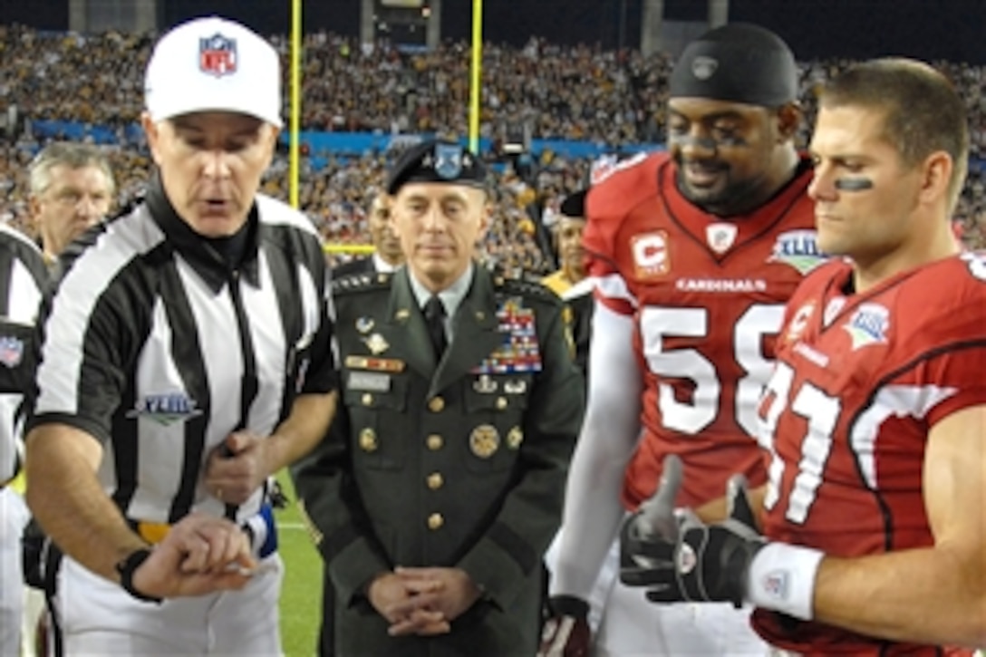 U.S. Army Gen. David H. Petraeus, commander, U.S. Central Command, gets ready to toss the coin at Super Bowl XLIII here Feb. 1, 2009, at Raymond James Stadium in Tampa, Fla. 

